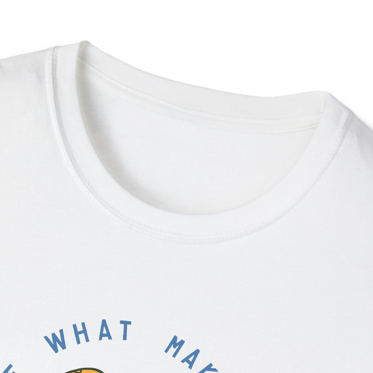 Close-up of "Do More of What Makes You Happy" text on white t-shirt hem, funny skater graphic detail