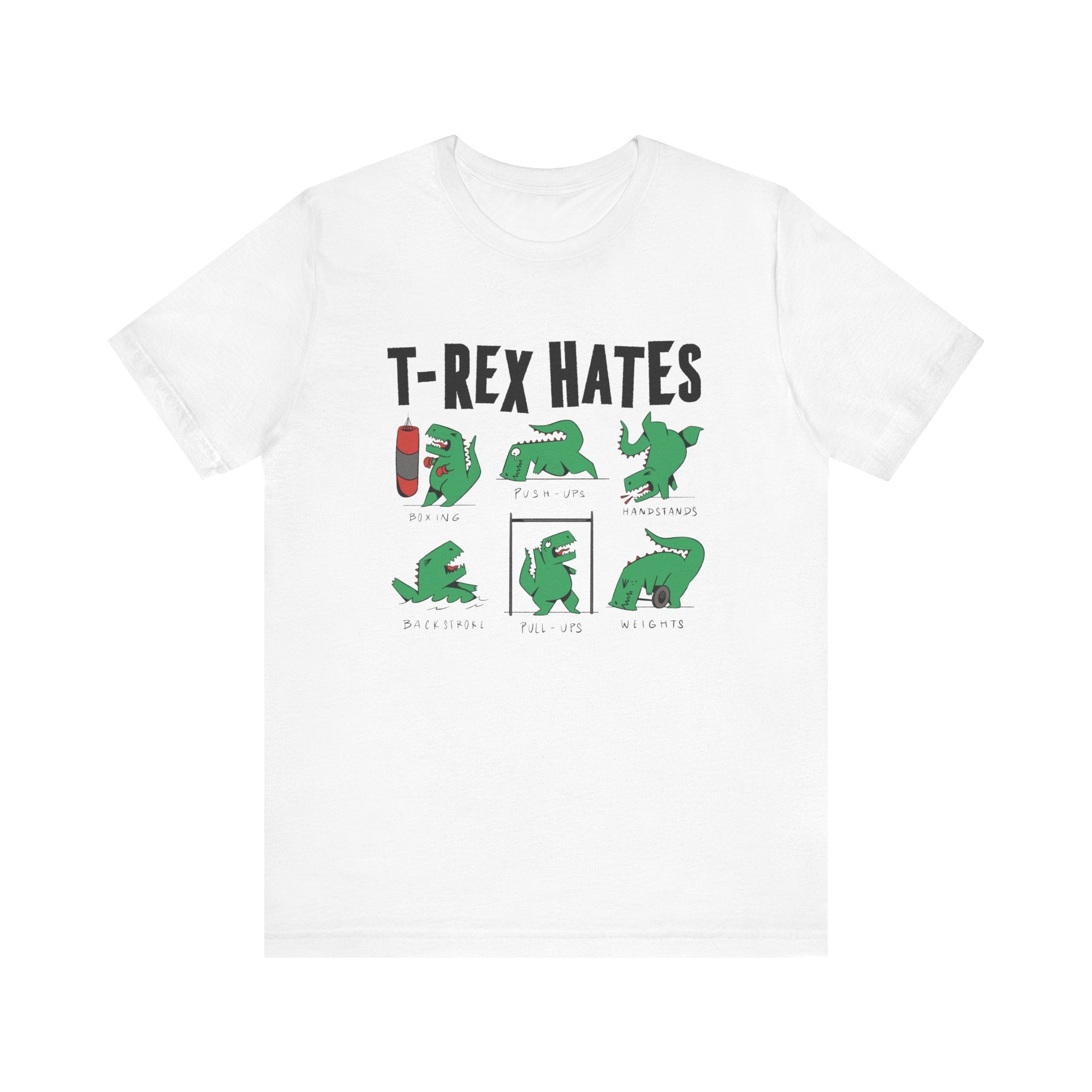 The Trex Hates - T-Shirt is a white cotton shirt with cartoon T-Rex illustrations struggling with exercises and the text "T-REX HATES"—a fun addition to any geeky wardrobe.