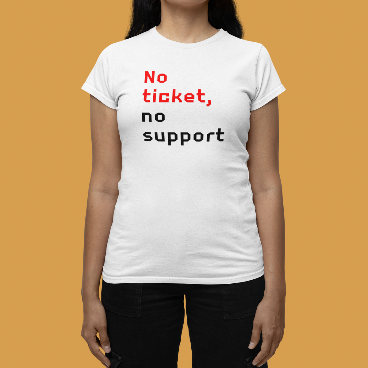 'No Ticket No Support' women's tee in white, woman modeling it on orange background, funny IT gift