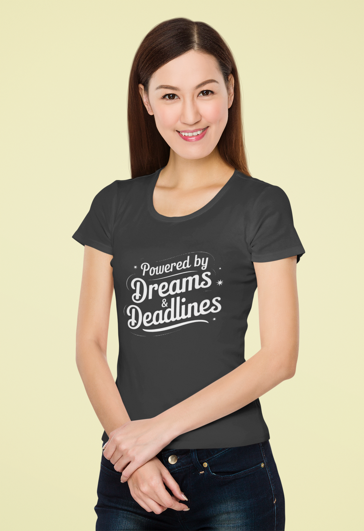 'Powered by Dreams & Deadlines' organic t-shirt in charcoal grey, woman wearing it, funny coder gift