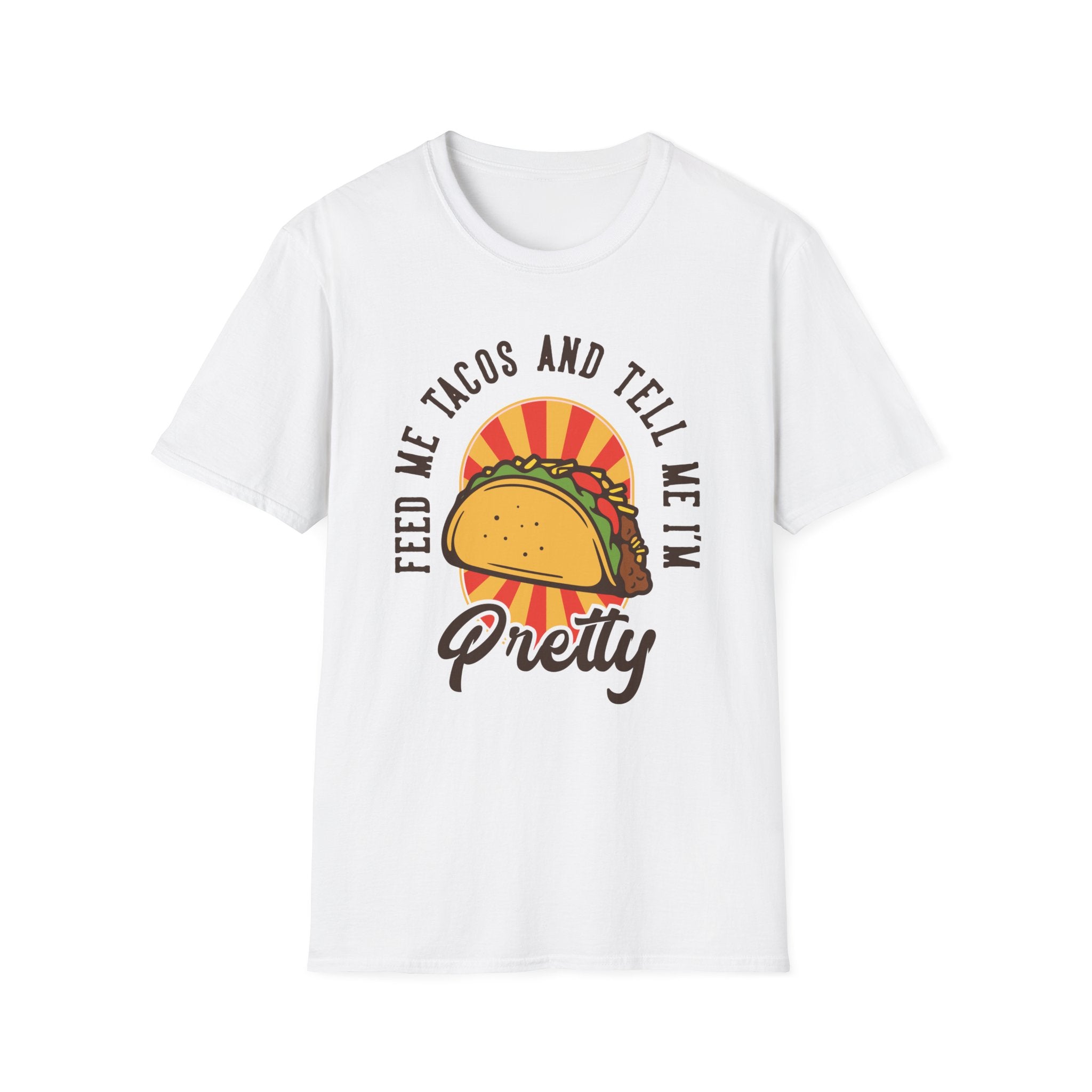Product Name: "Feed Me Tacos and Tell Me I'm Pretty" White T-Shirt displaying a taco graphic along with the bold text "Feed me tacos and tell me I'm pretty." Ideal for taco lovers or as a playful outfit choice on taco Tuesdays.