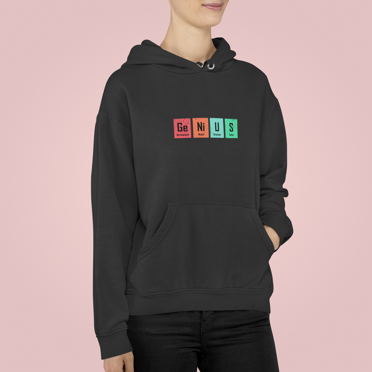 'Genius' periodic table pun hoodie in black, woman on pink background, funny science hoodie gift
