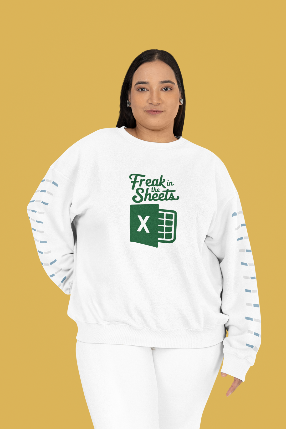 'Freak In The Sheets' sweatshirt in white, woman wearing it on mustard background, funny spreadsheet gift