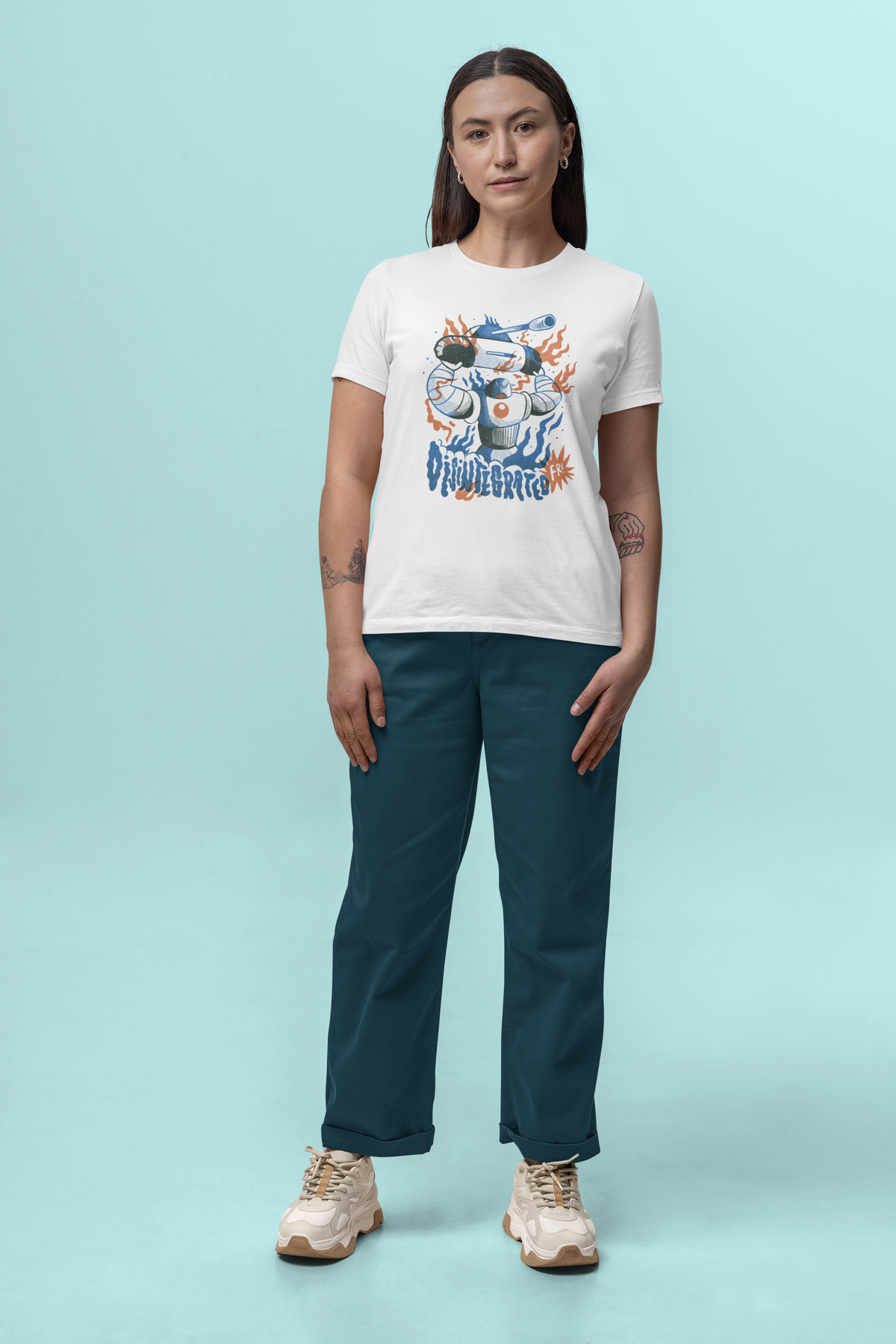 Huge Robot t-shirt in white, woman model wearing it against a teal studio background