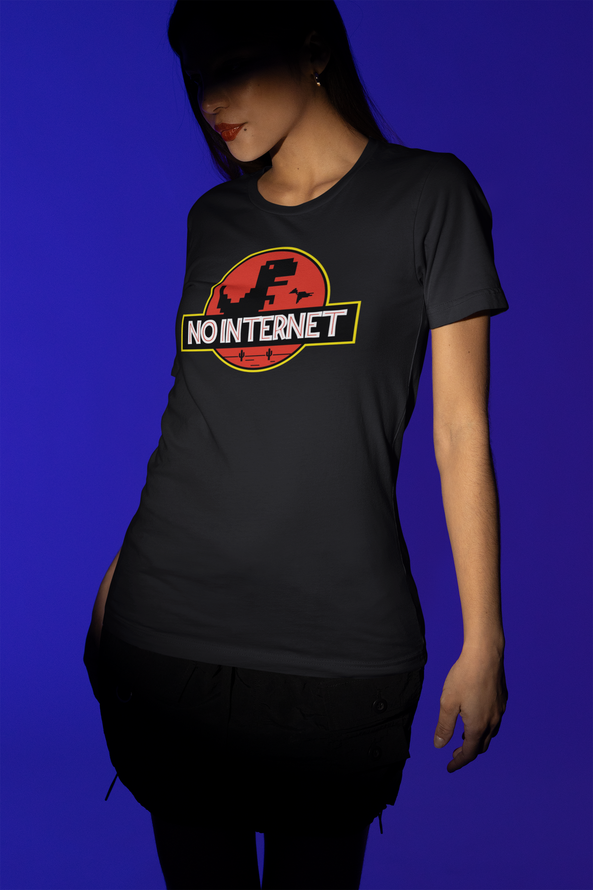No Internet dinosaur logo t-shirt in black, woman wearing it under blue lighting, funny sarcastic gift