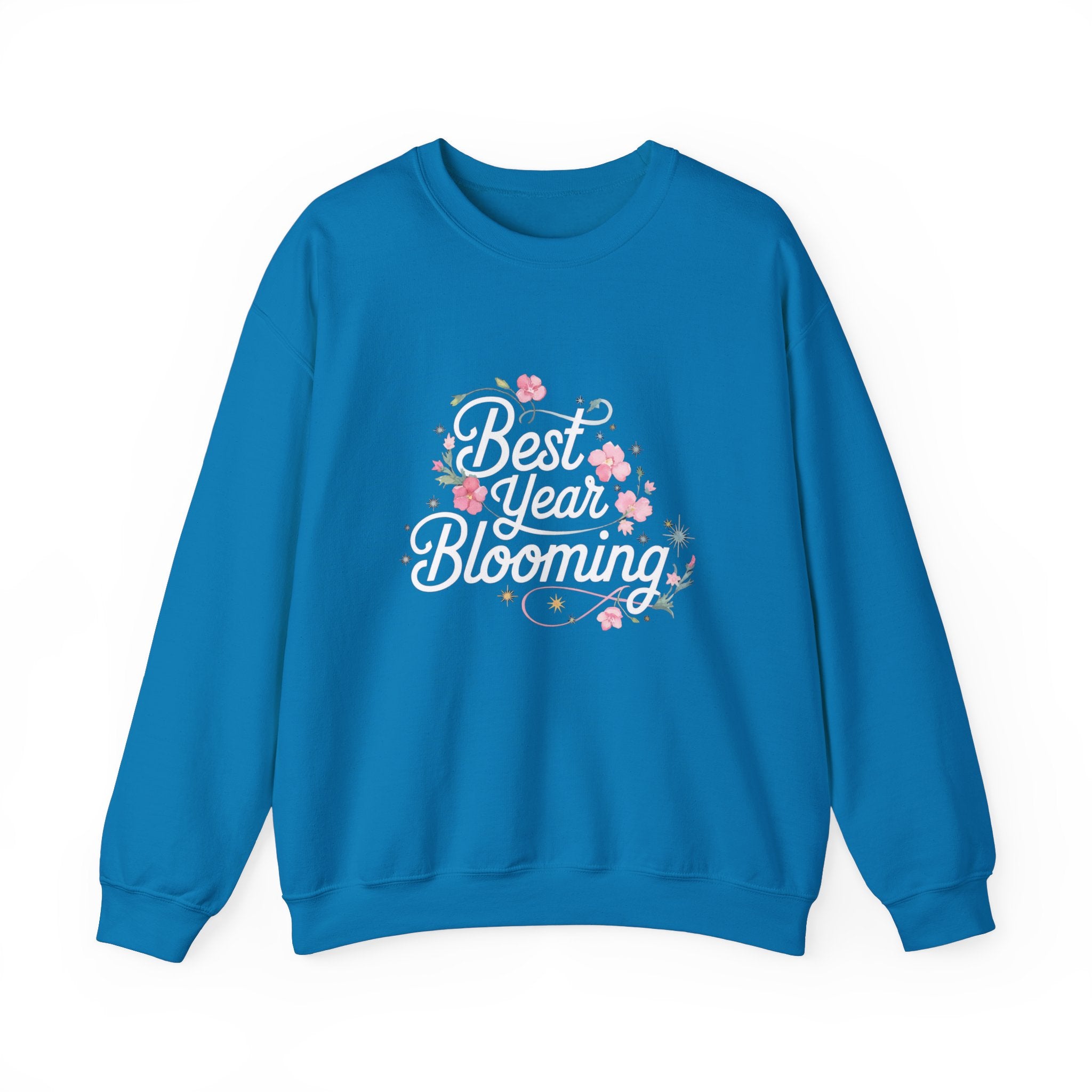 The Best Year Blooming Sweatshirt features blue ultra-soft fabric and "Best Year Blooming" text with pink floral accents—an ideal autumn staple.