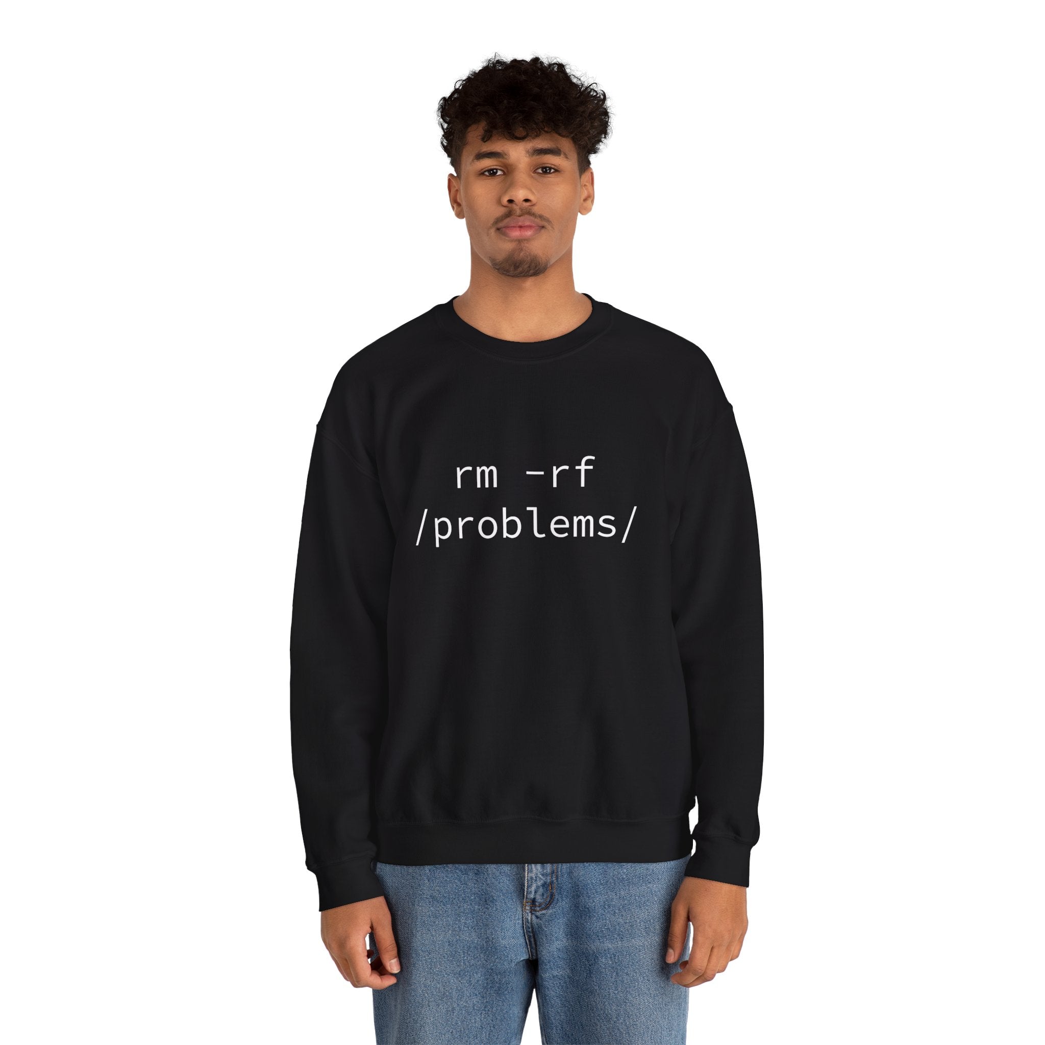 Dressed in a warm RMRF Problems - Sweatshirt ideal for chillier weather, an individual faces forward with the prominent "rm -rf /problems/" text displayed on the front.