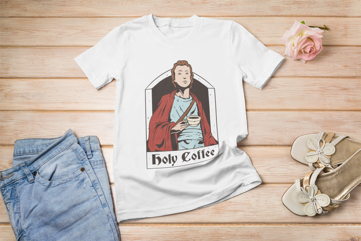 'Holy Coffee' saint t-shirt in white, flat lay with sandals