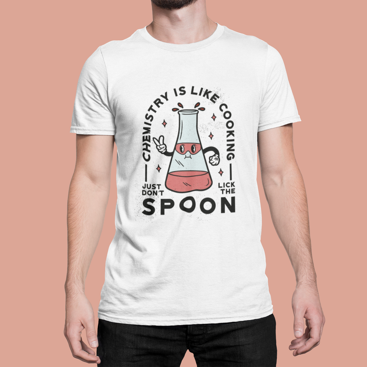 'Chemistry Is Like Cooking' t-shirt in white, man model wearing it against a peach background