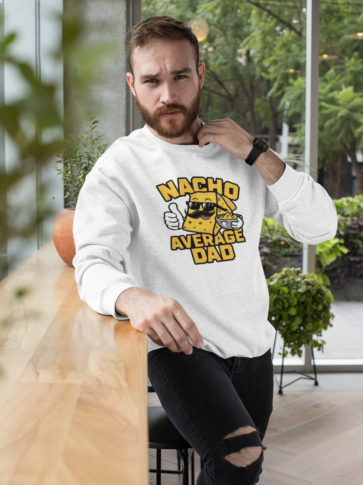 "Nacho Average Dad" sweatshirt in white, man wearing it outdoors, funny Father's Day gift