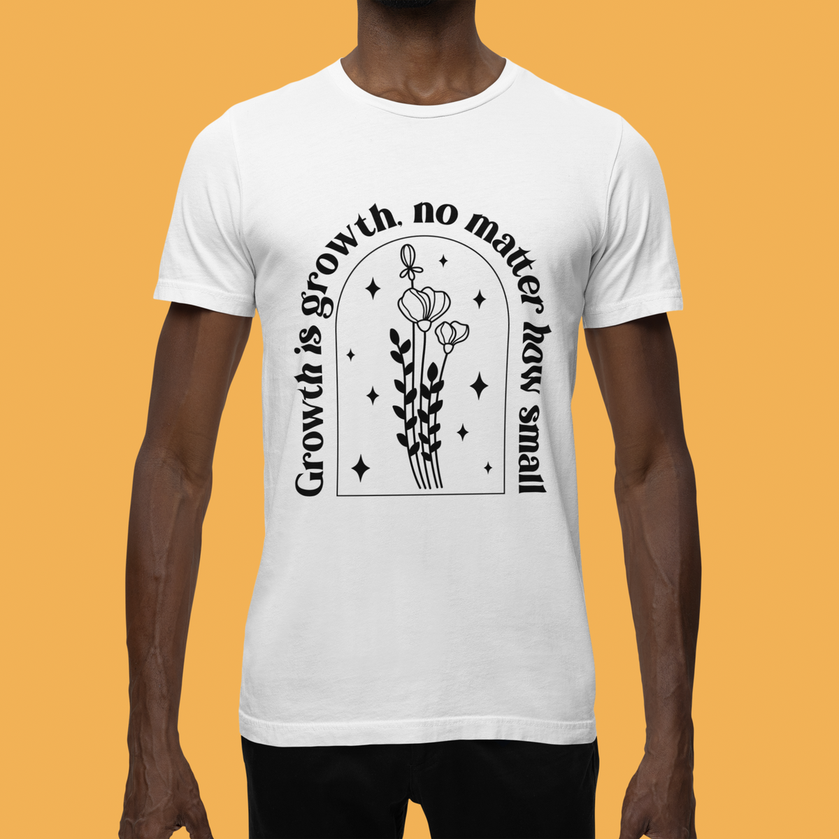 'Growth Is Growth No Matter How Small' t-shirt in white, man wearing it on orange background