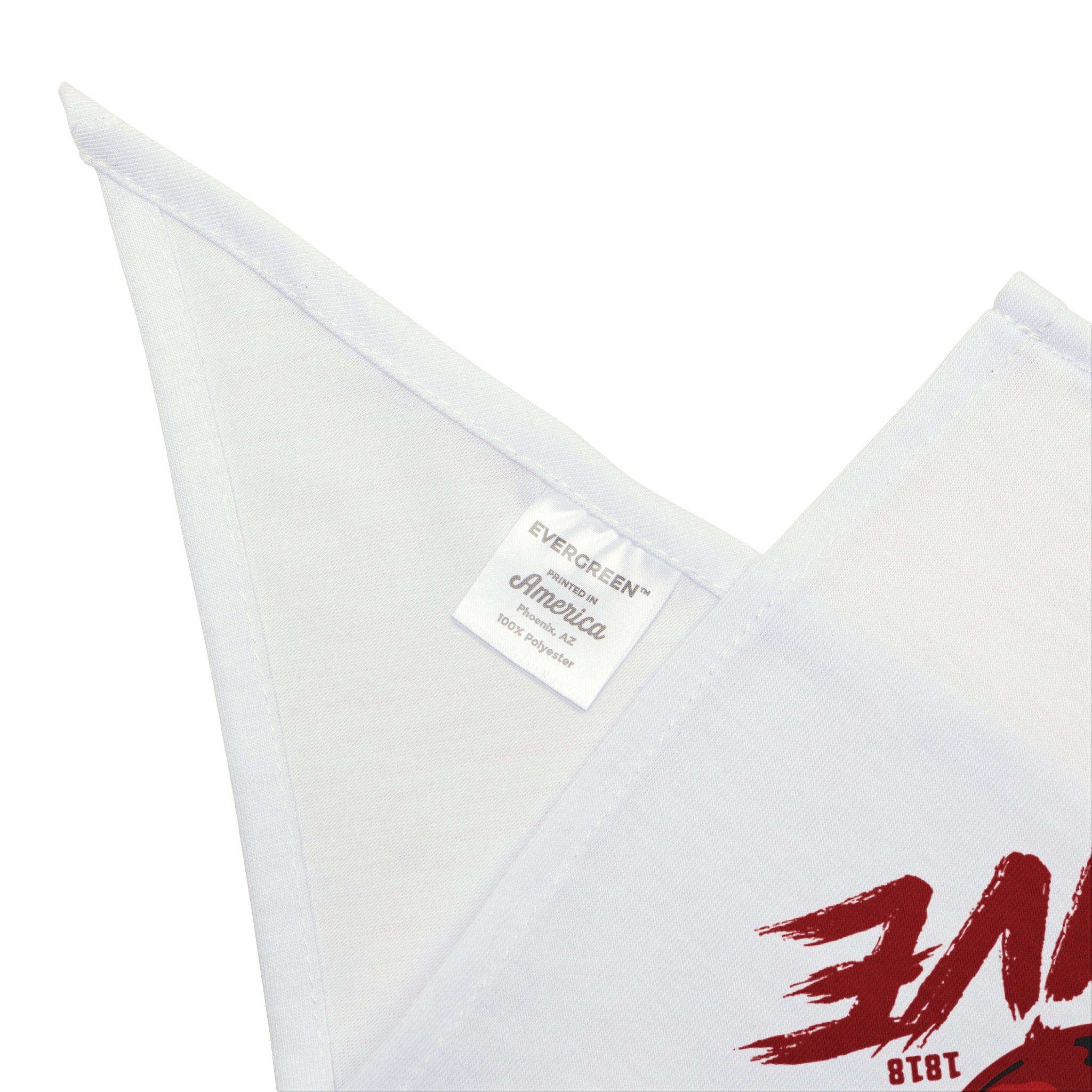 Close-up of the Alive- Pet Bandana, made from white 100% polyester fabric with an "EVERGREEN America" label and partially visible red printed text on the right side.