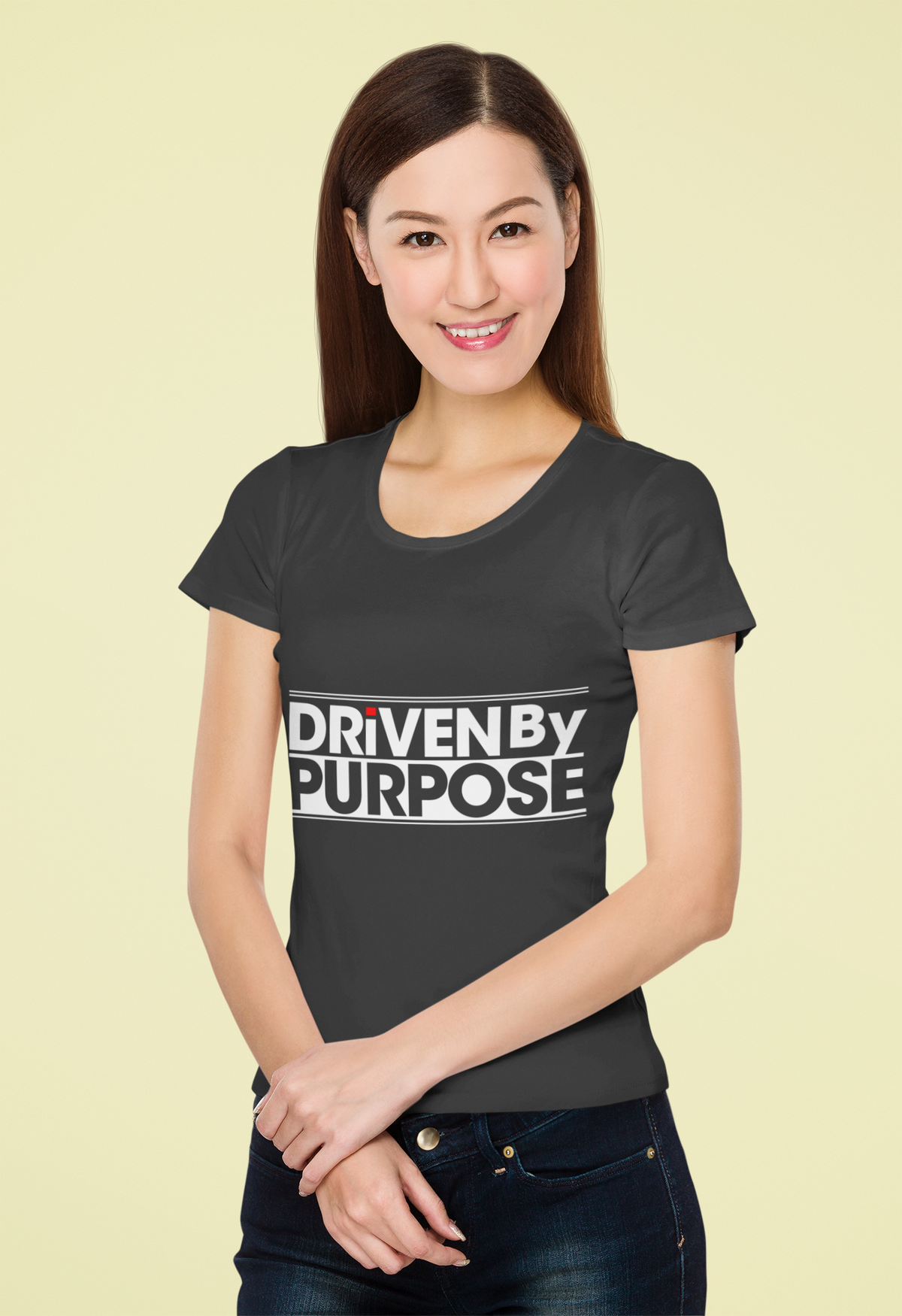 'Driven by Purpose' organic t-shirt in charcoal, woman wearing it in studio, inspirational quote gift