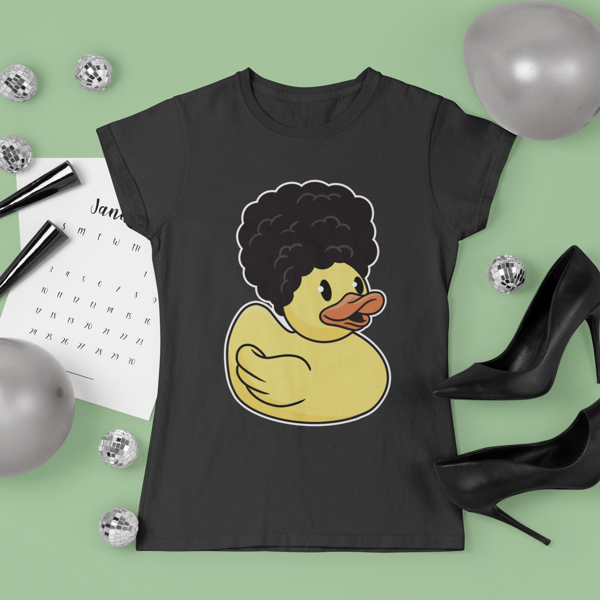 Cool duck t-shirt in black, flat lay styled with disco balls and heels, funny groovy animal gift