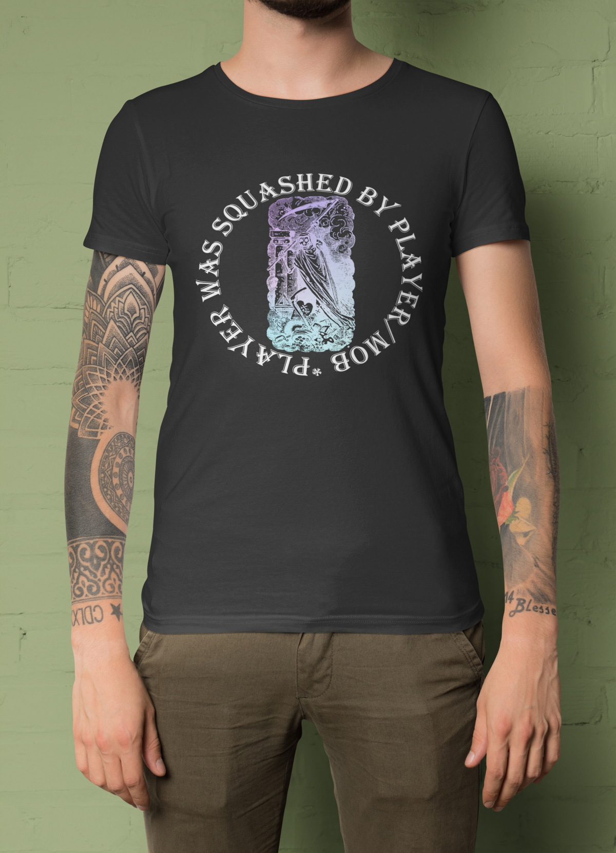 'Player Was Squashed By Player Mod' t-shirt in black, tattooed man wearing it outdoors