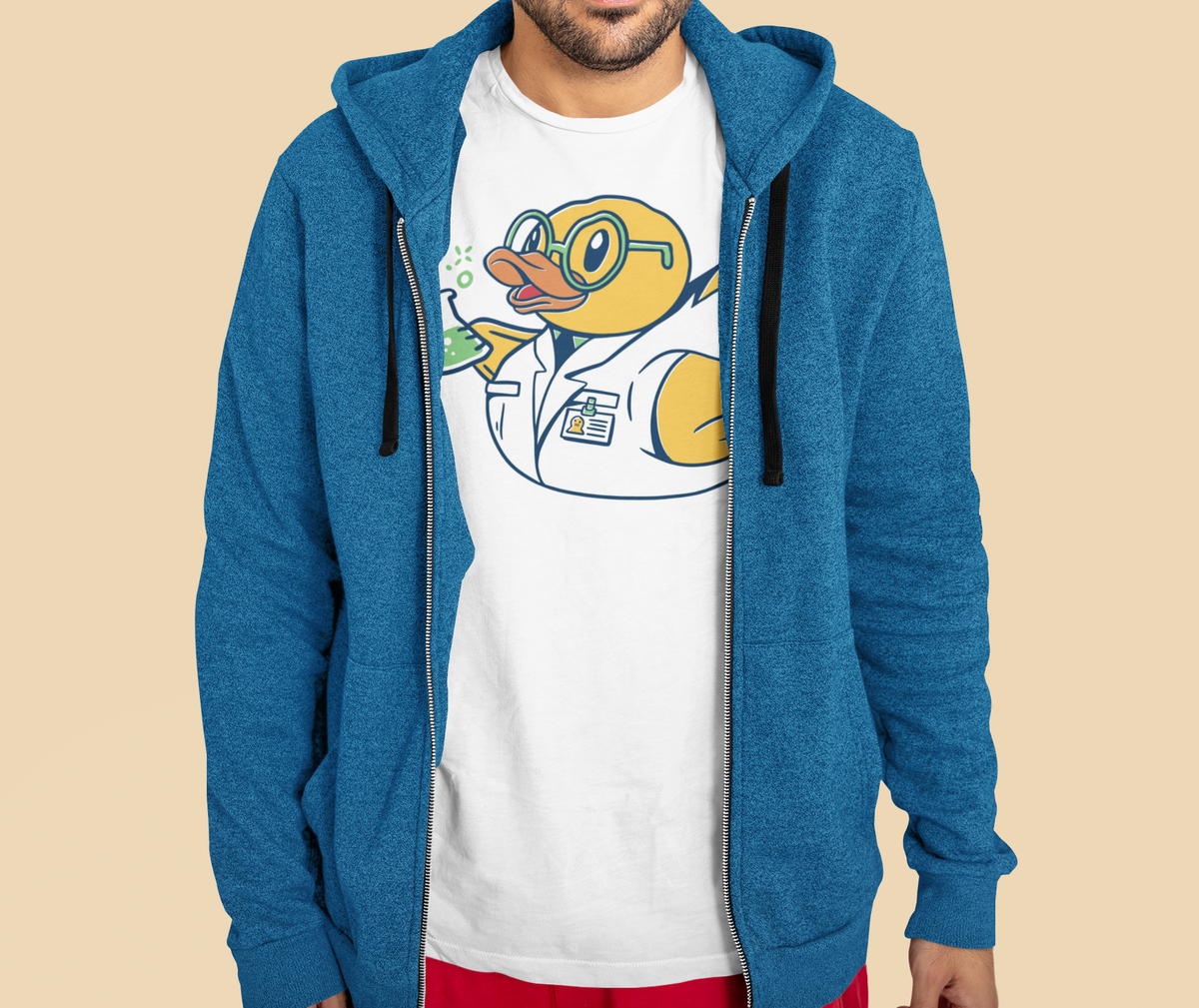 Science duck t-shirt in white, man model wearing it under a blue zip hoodie, funny science teacher gift