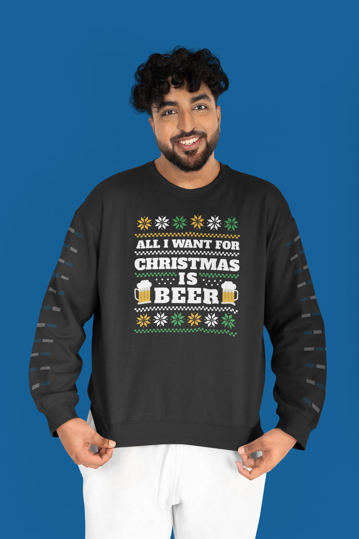 'All I Want For Christmas Is Beer' crewneck in black, man wearing it against a blue backdrop, funny gift