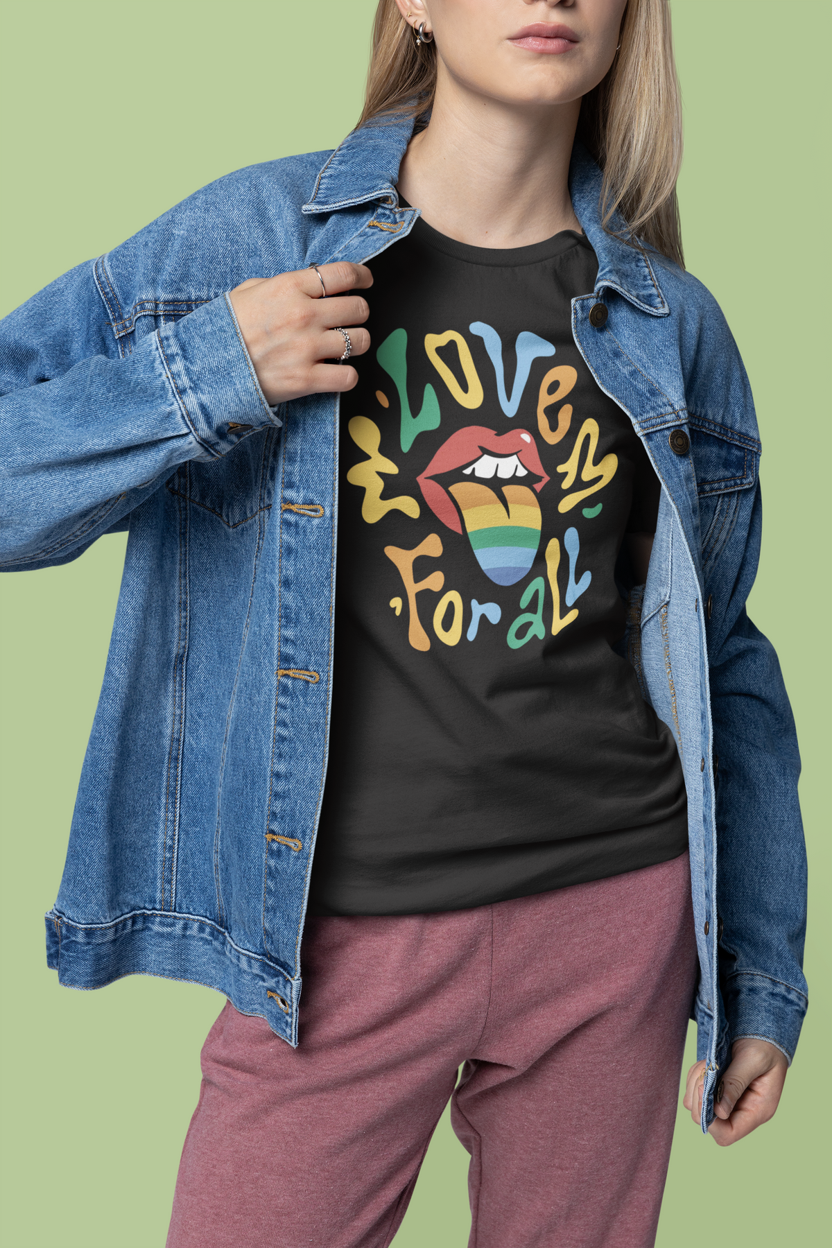 'Love for All' T-shirt in black, woman wearing it with a denim jacket, funny pride gift shirt