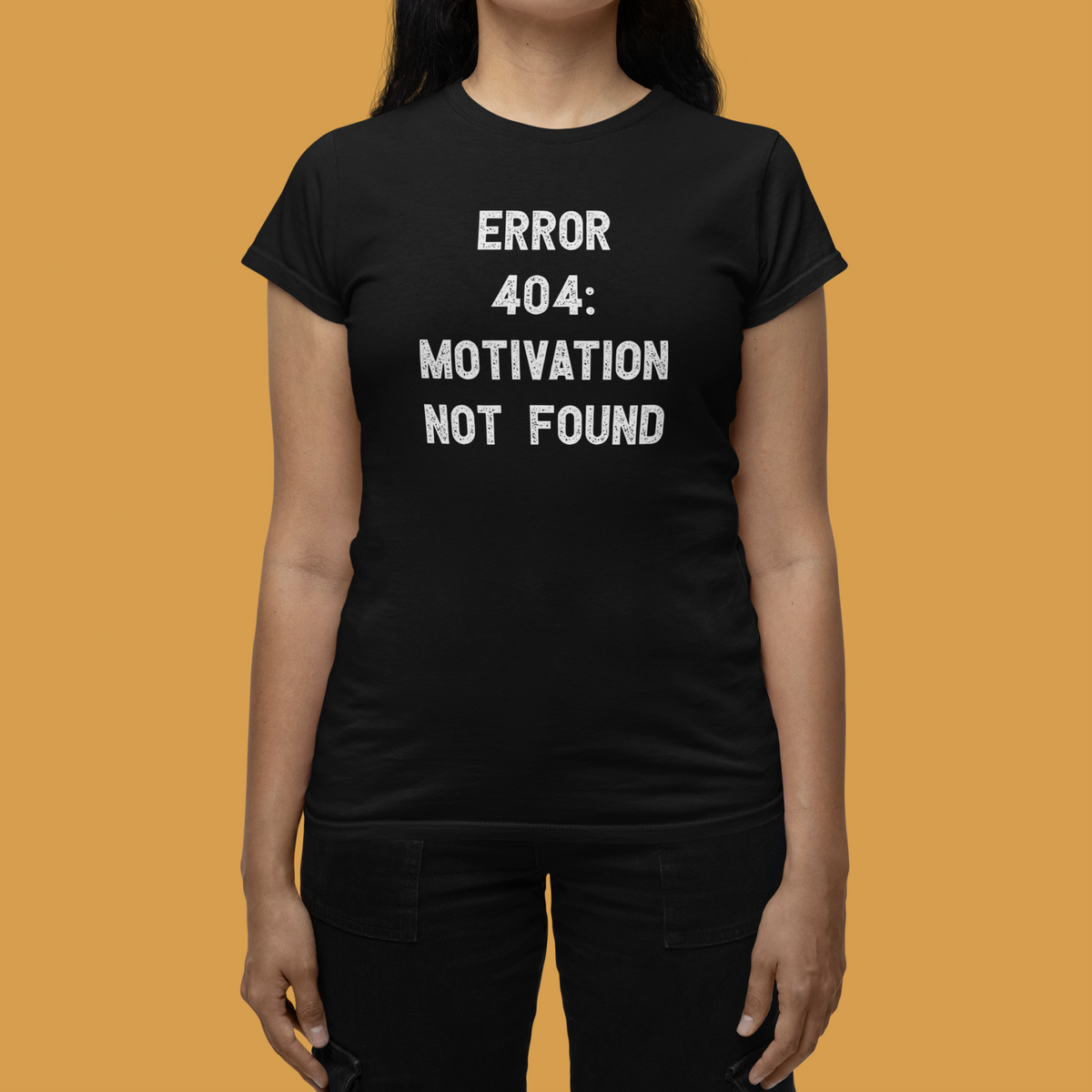 'Error 404 Motivation Not Found' women's tee in black, woman on mustard background, funny developer tee