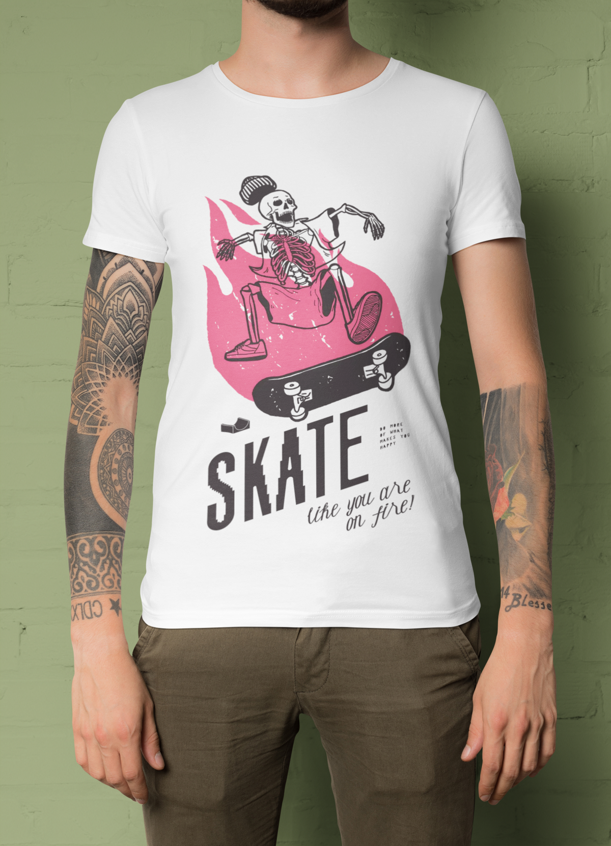 "Skeleton Skate" skateboarding t-shirt in white, tattooed man wearing it, funny skater graphic gift