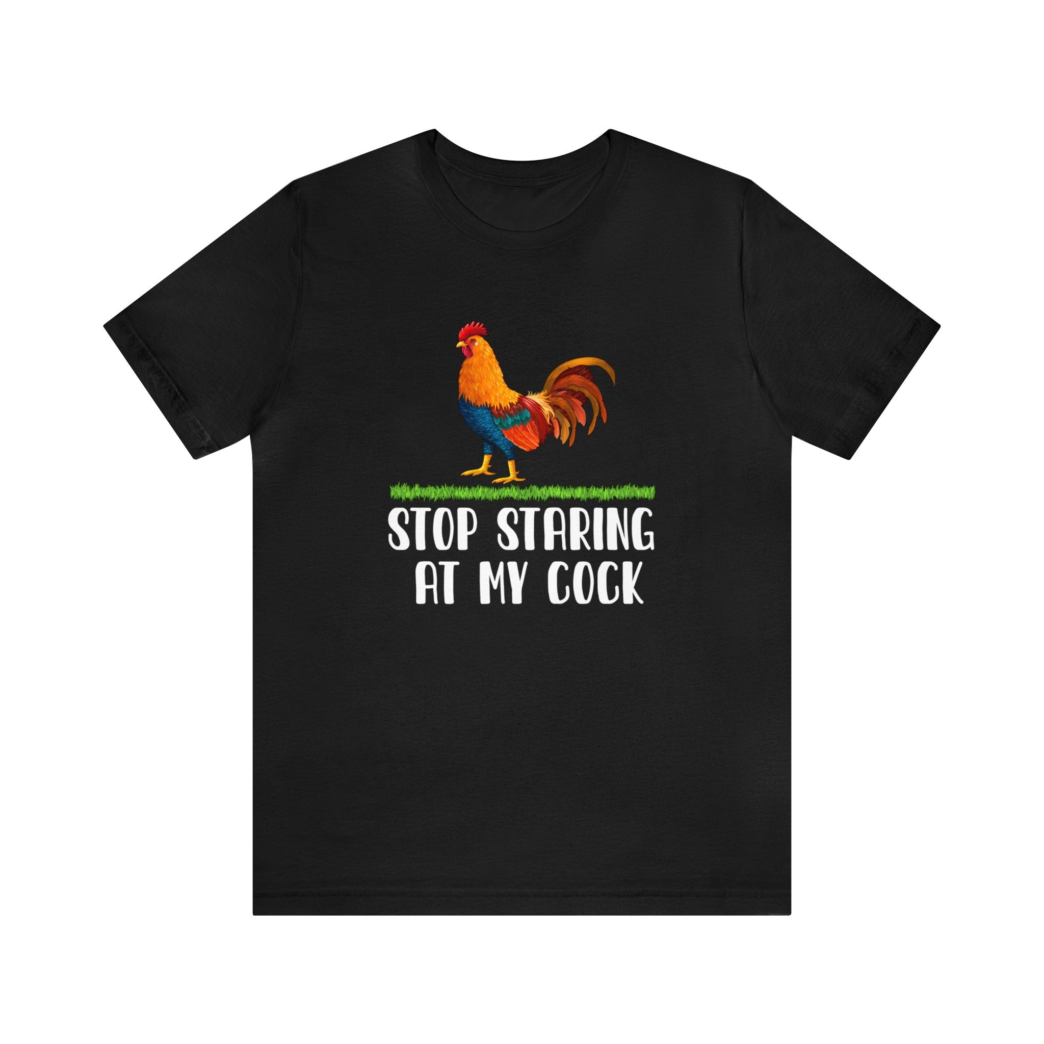 The "Stop Staring at My Cock T-Shirt" features bold graphics of a colorful rooster above humorous text, providing premium comfort.