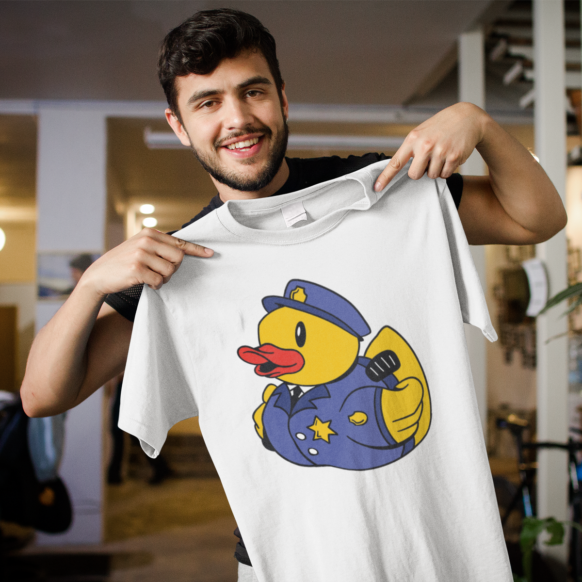 Police officer duck t-shirt in white, man model holding it up indoors, funny gift for police officers