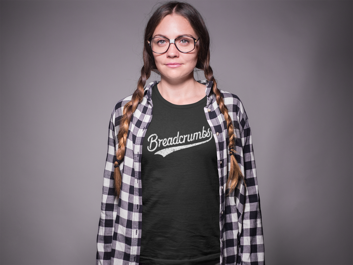 'Breadcrumbs' script logo t-shirt in black, braided woman with glasses wearing it, funny gift for programmers
