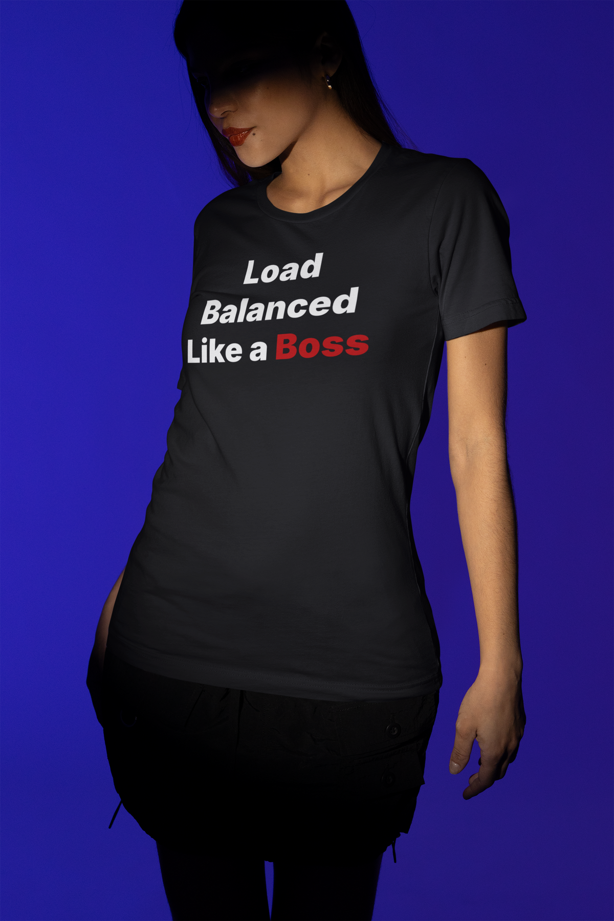 'Load Balanced Like a Boss' t-shirt in black, woman modeling side profile, funny gift for IT professionals