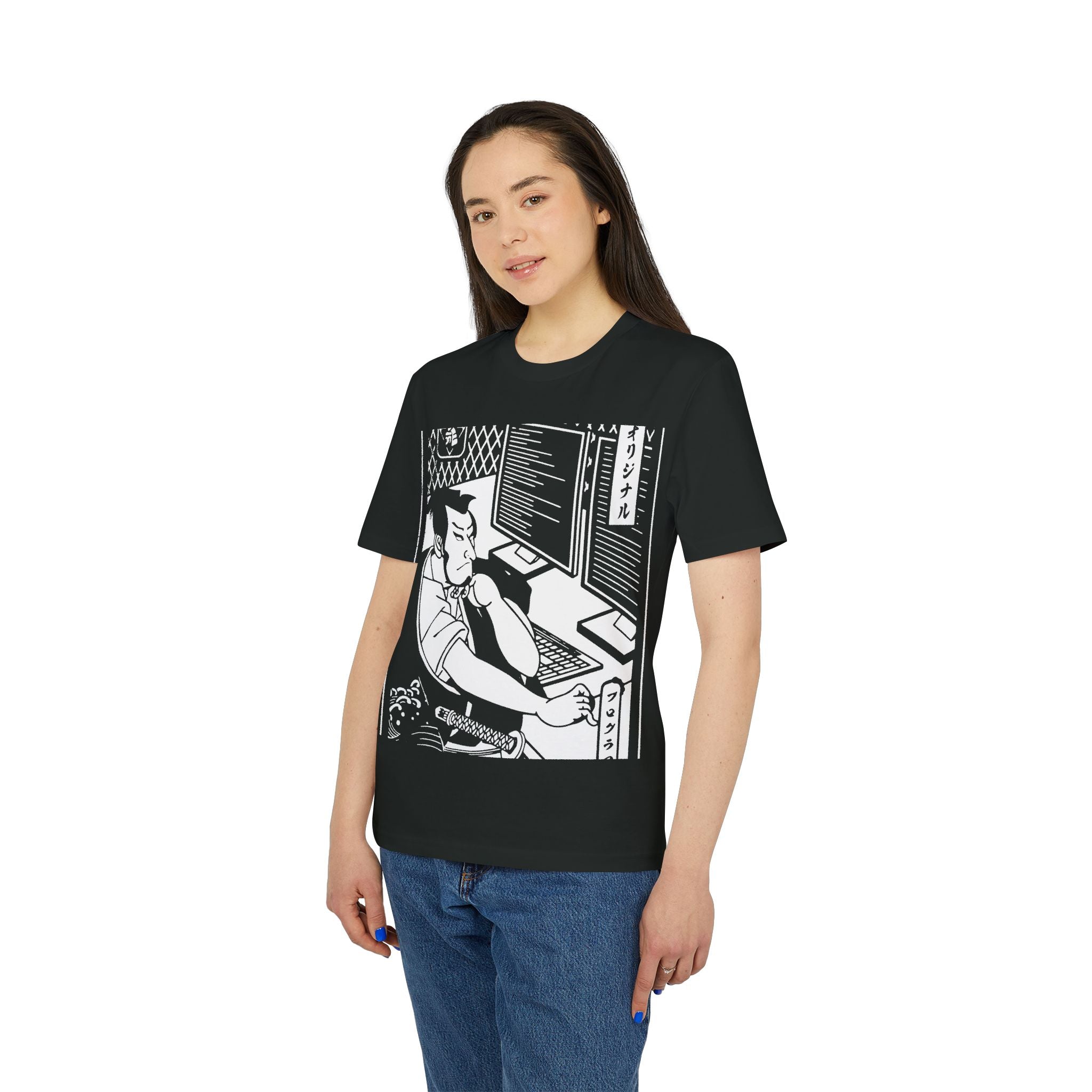 A woman wears the Samurai Coding - Organic T-Shirt, featuring a monochrome anime character at a desk with Japanese text—ideal for eco-conscious programmers who value style and sustainability.