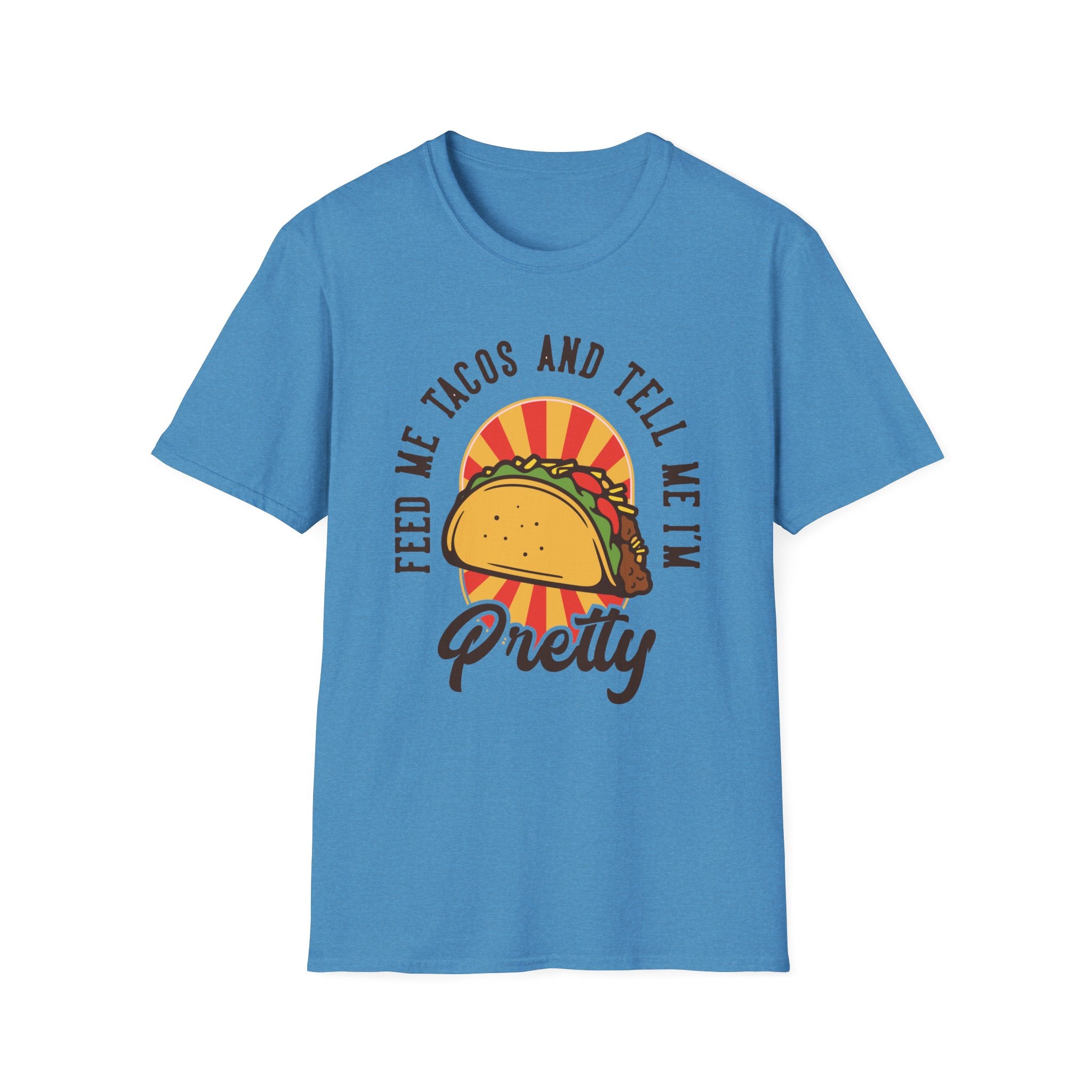 Feed Me Tacos and Tell Me I'm Pretty T-Shirt is designed with a vibrant blue hue, showcasing a taco graphic alongside retro-style text. It's an ideal choice for enthusiastic taco lovers, particularly for celebrating taco Tuesdays.