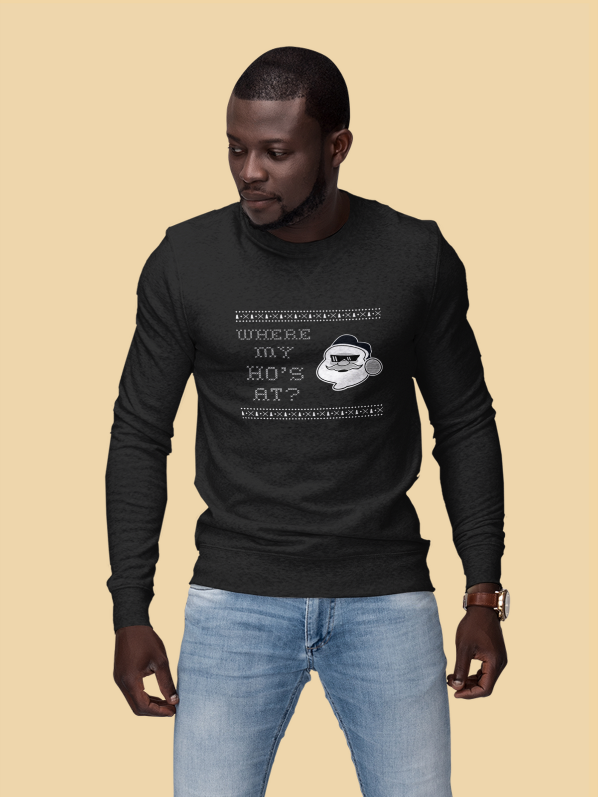 'Where My Ho's At' Santa graphic sweatshirt in black, man wearing it on tan backdrop, funny Christmas gift for him