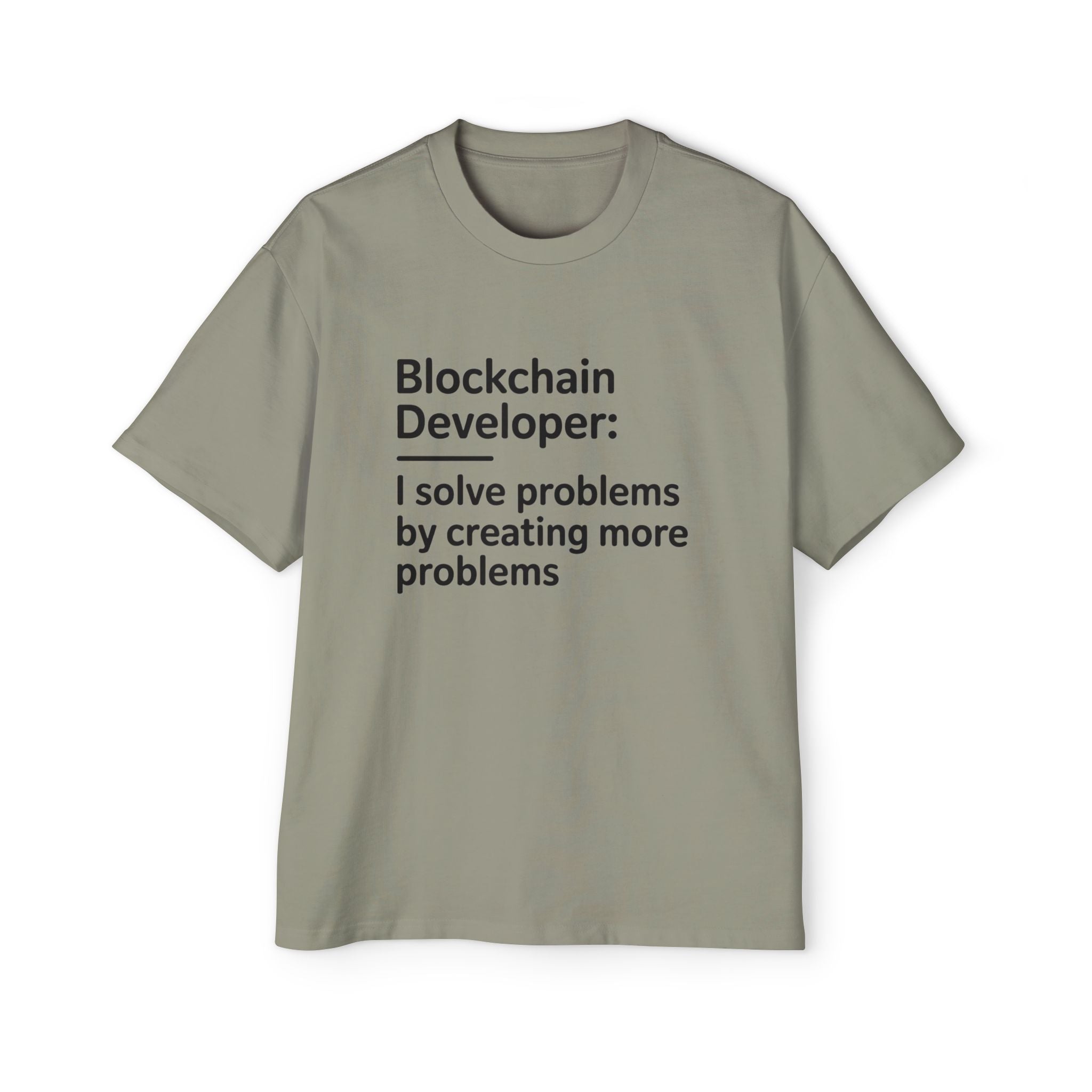 The Blockchain Developer - Heavy Oversized Tee is a gray 100% cotton shirt featuring "Blockchain Developer: I solve problems by creating more problems" in black—a comfy statement piece for any coder.
