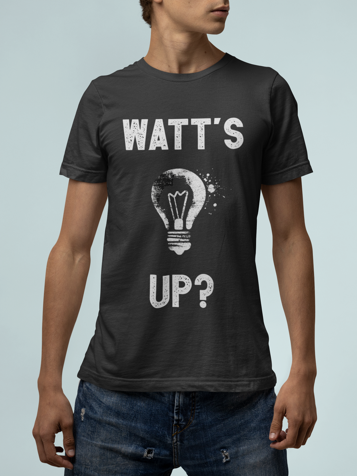 'Watt's Up?' electrician t-shirt in black, man on teal background, funny lightbulb pun tee gift