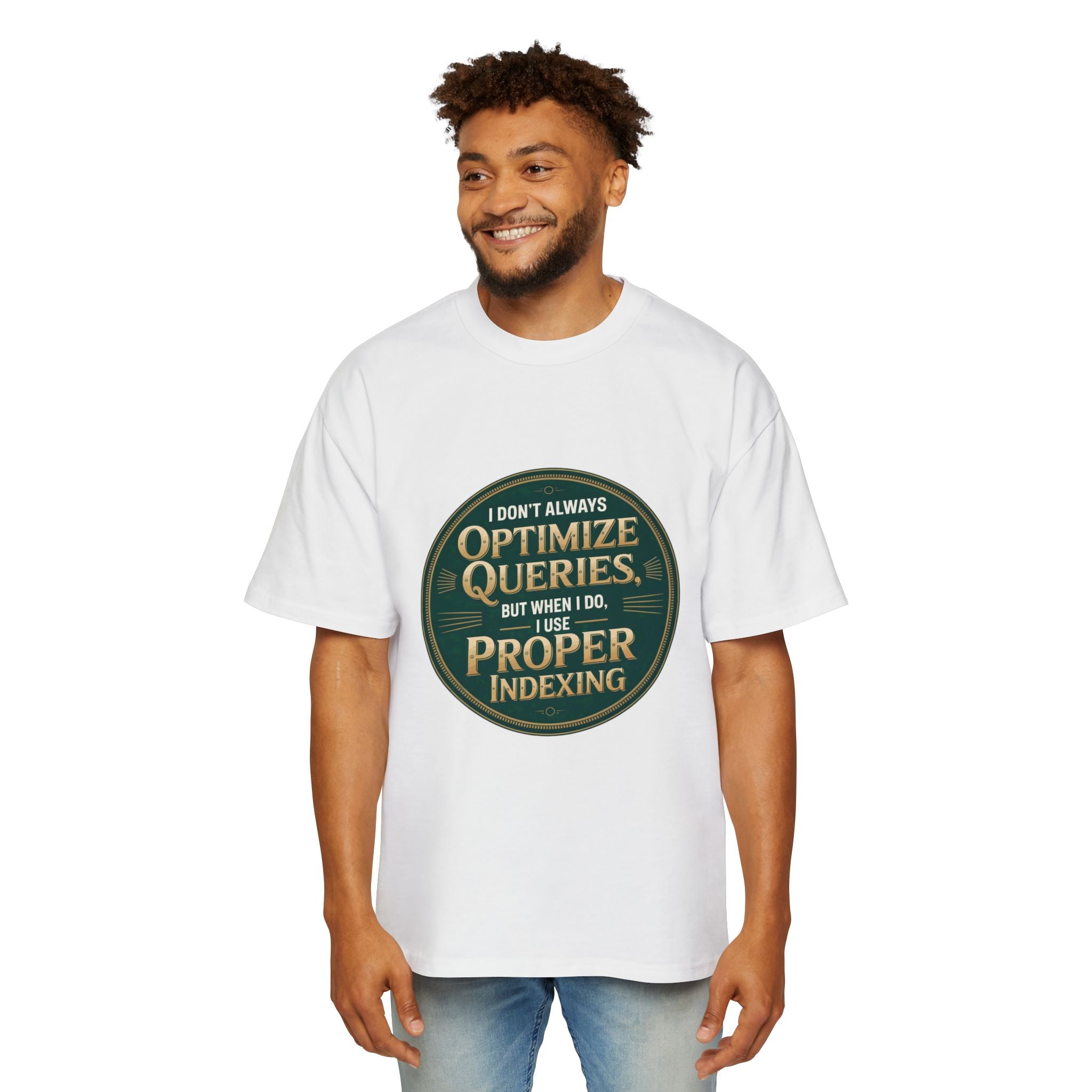A man wearing the "I Don't Always Optimize Queries - Heavy Oversized Tee," an oversized shirt made from carded cotton with a circular design that reads, "I don't always optimize queries, but when I do, I use proper indexing.