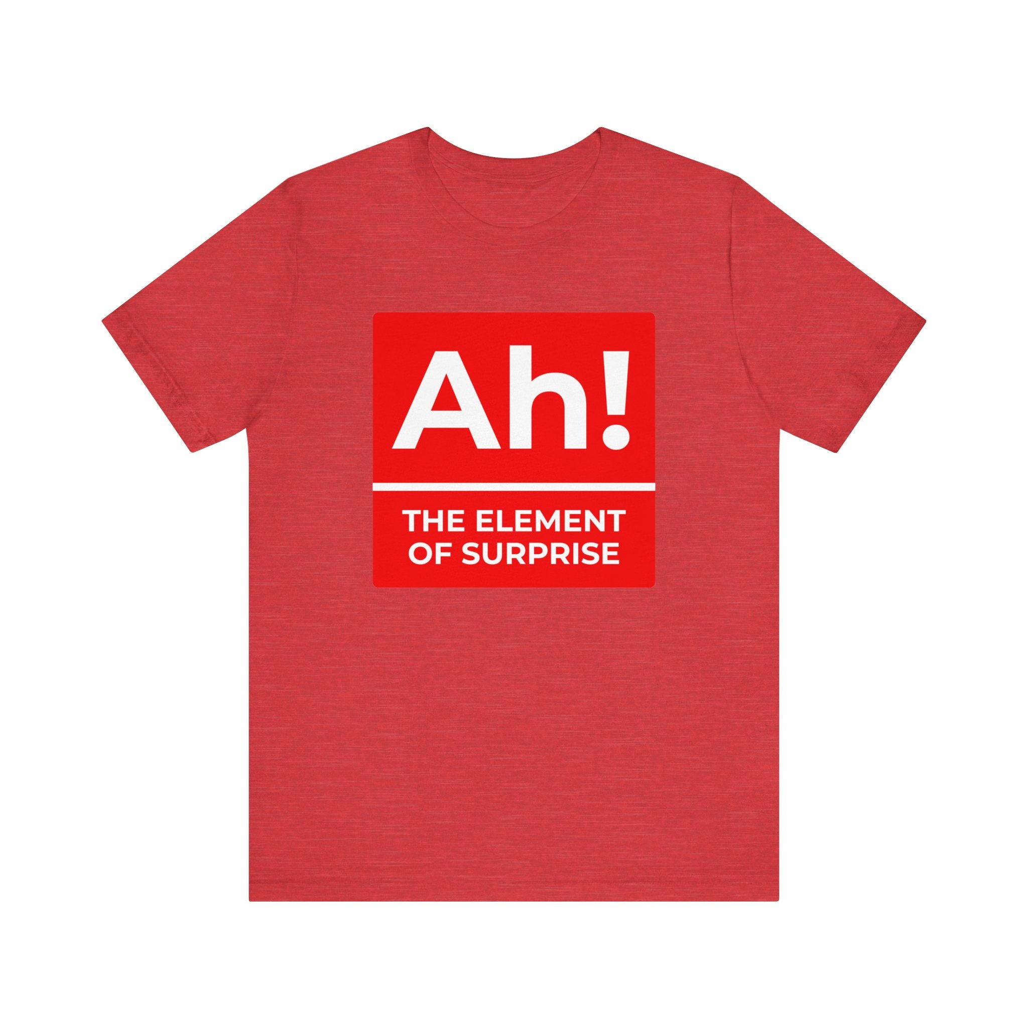 The "Ah! the Element of Surprise" T-shirt showcases a witty "Ah!" design labeled as "The Element of Surprise" in white text on a big red square. Ideal for science buffs and nerd culture fans, this comfy tee is a clever blend of humor and style.