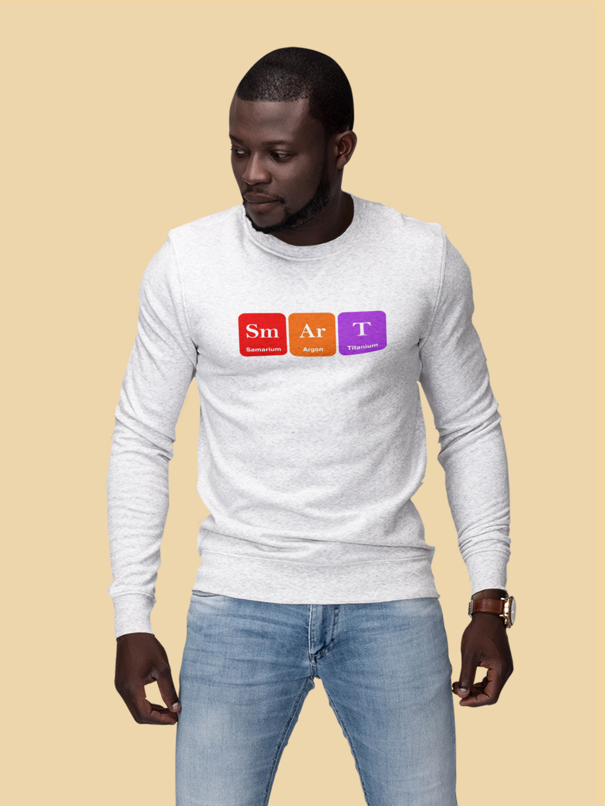 'Smart' periodic table sweatshirt in white, man wearing it against a tan backdrop, funny science pun gift