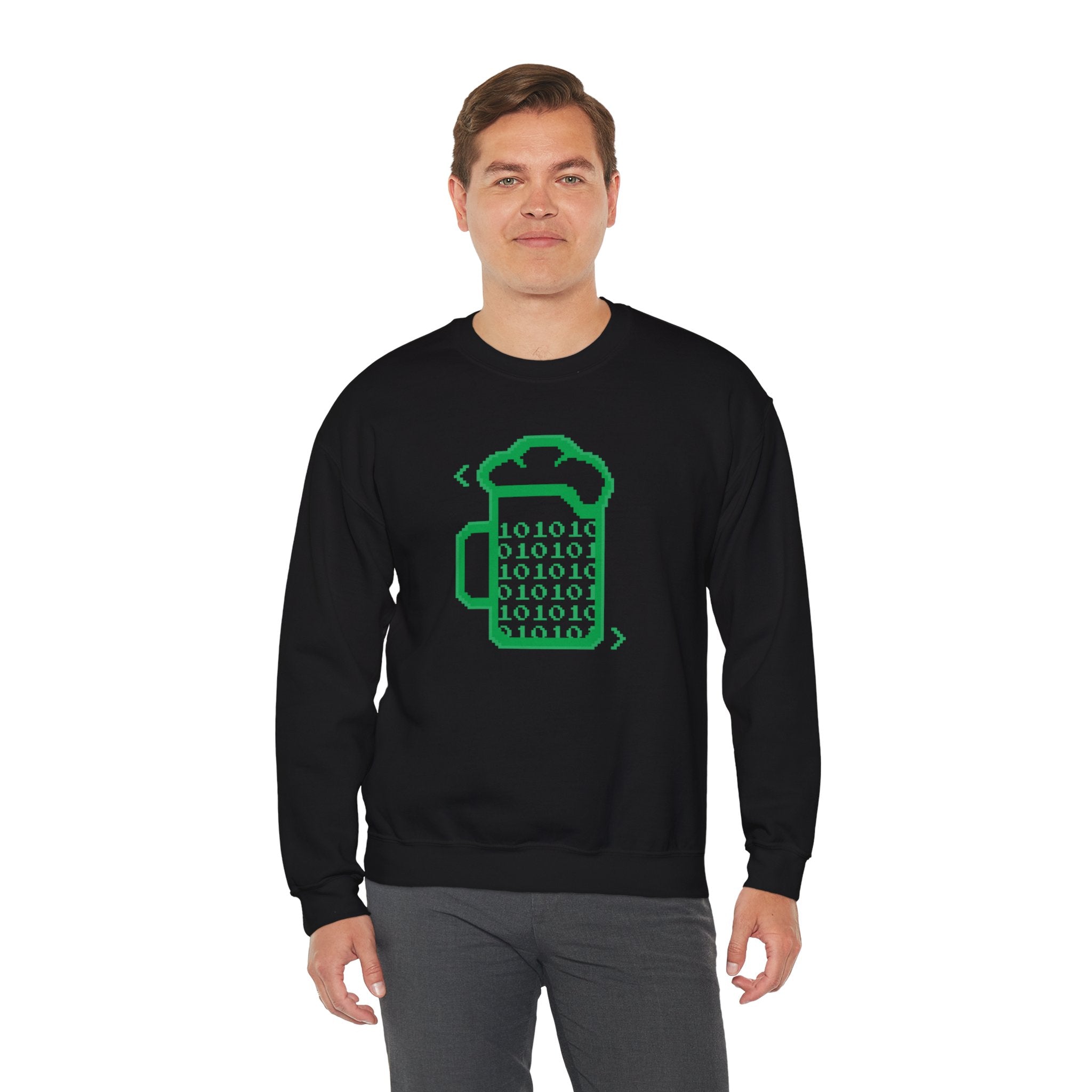 A man wears the Beer Code Sweatshirt, featuring a black design with a green beer mug graphic made of binary code—perfect for showing off your geek pride.