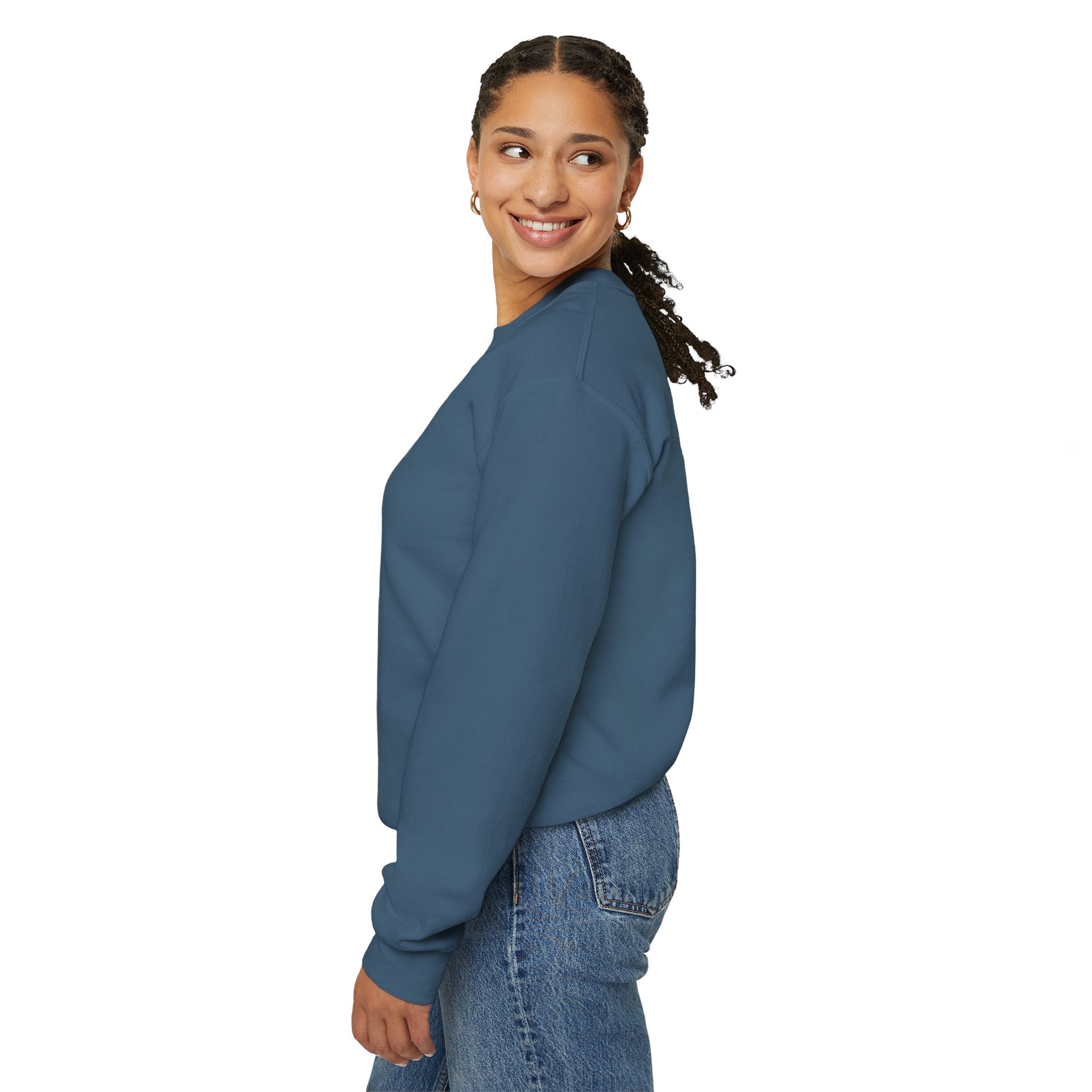 A person stands sideways wearing the Load Balanced Life sweatshirt and jeans, exuding cozy comfort with a gentle smile against a pristine white background.