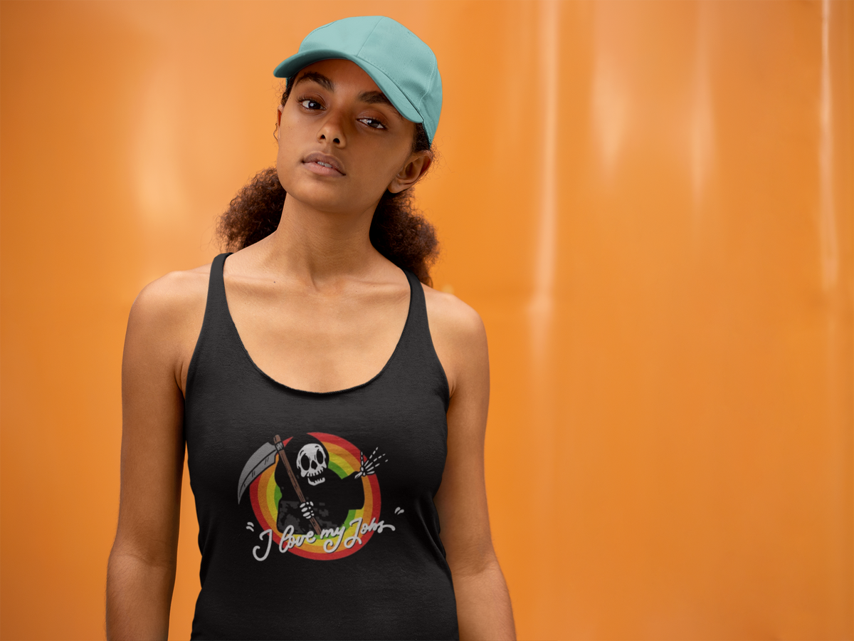 'Love My Jobs' racerback tank top in black, woman wearing it by an orange wall, Tank Top mockup, Geekpsters