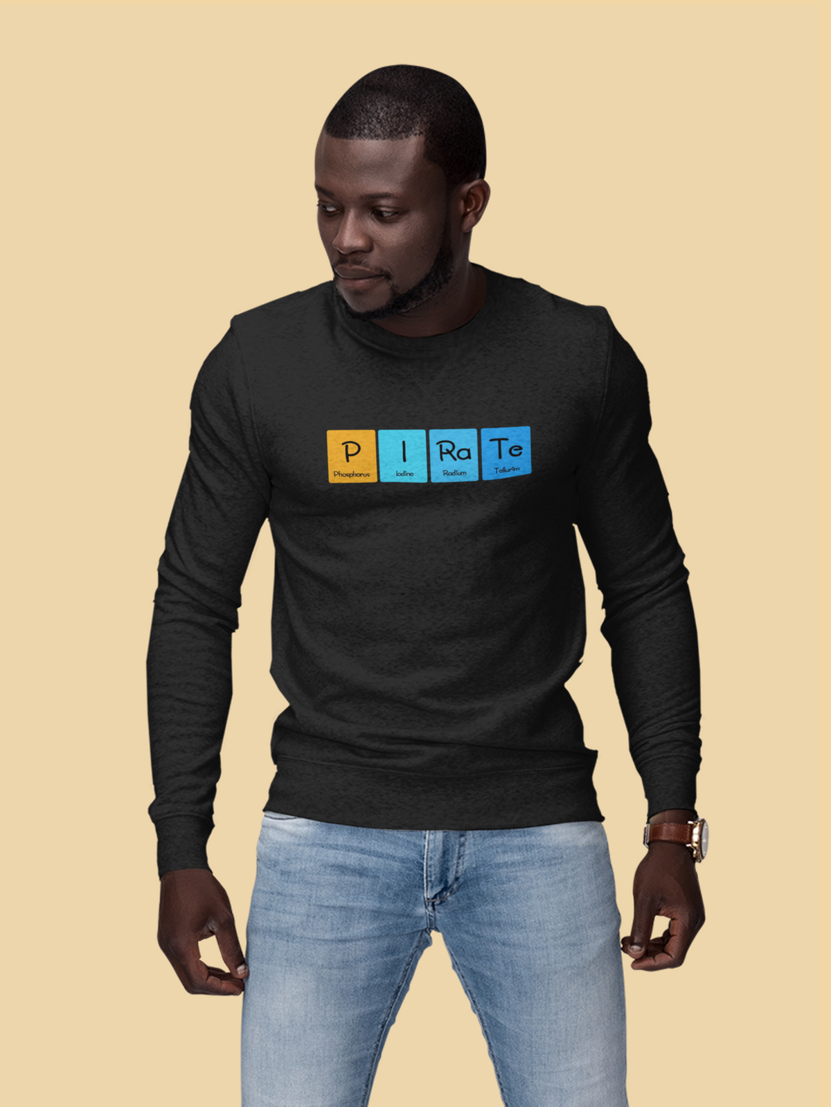 'P-I-Ra-Te' periodic table sweatshirt in black, man wearing it on tan background, funny science gift