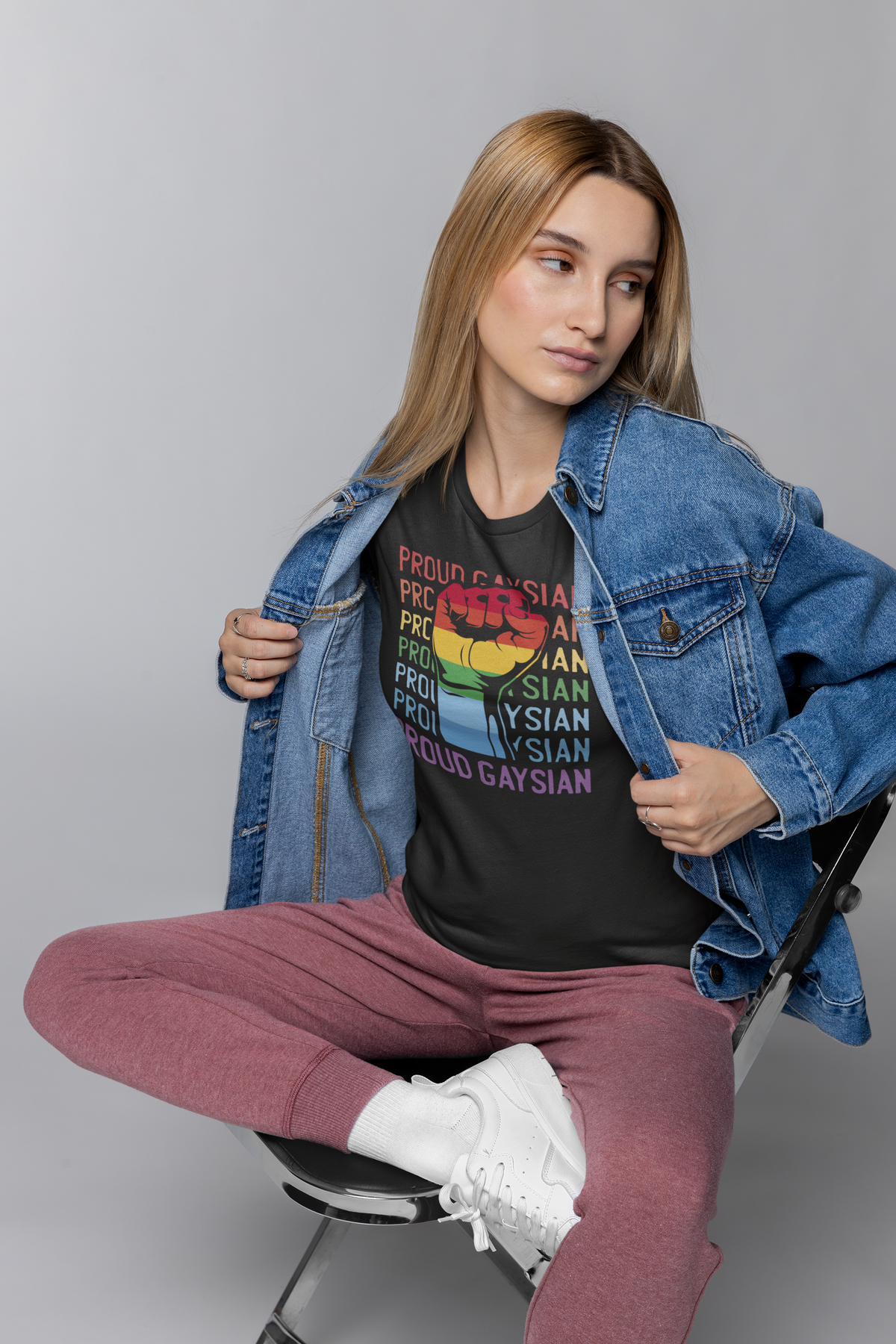'Proud Gaysian' T-shirt in black, woman wearing it with a denim jacket, funny asian pride gift