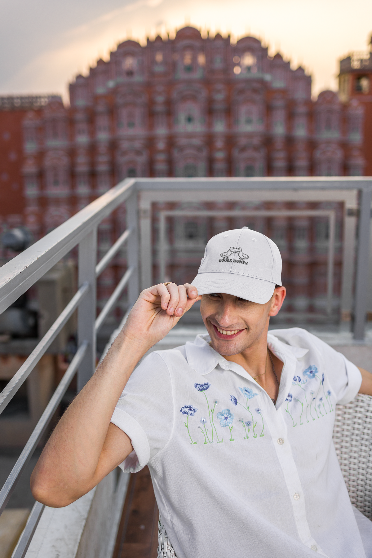 Goose Bumps pun dad hat, man on a city balcony, lifestyle mockup, Geekpsters