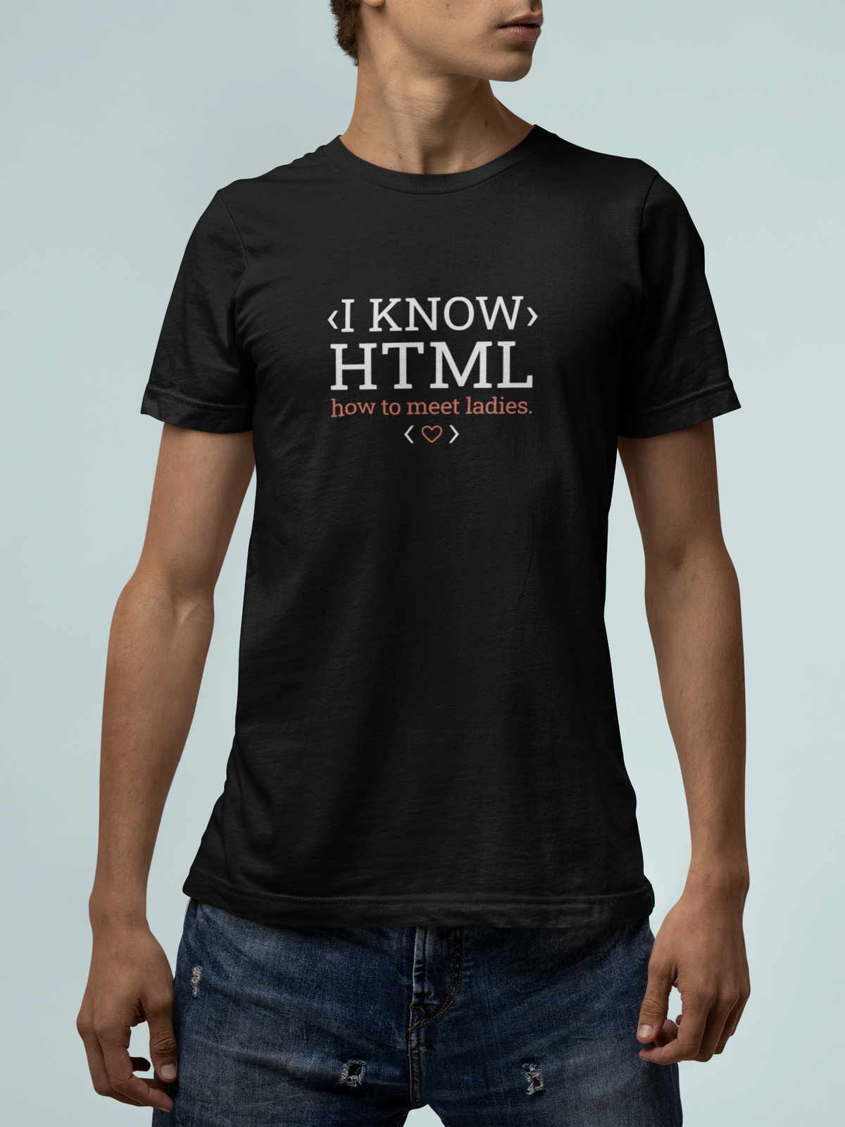 'I Know HTML' t-shirt in black, man against a light backdrop