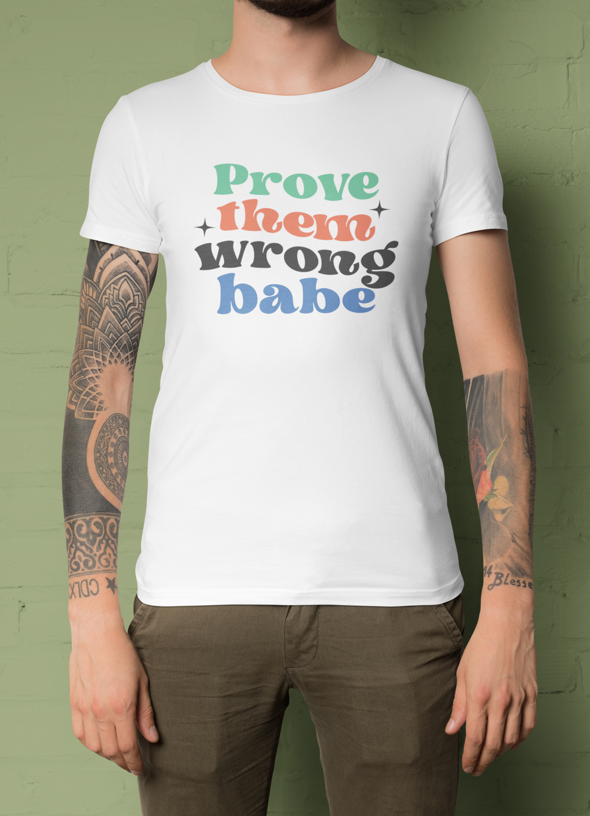 'Prove Them Wrong Babe' t-shirt in white, tattooed man wearing it