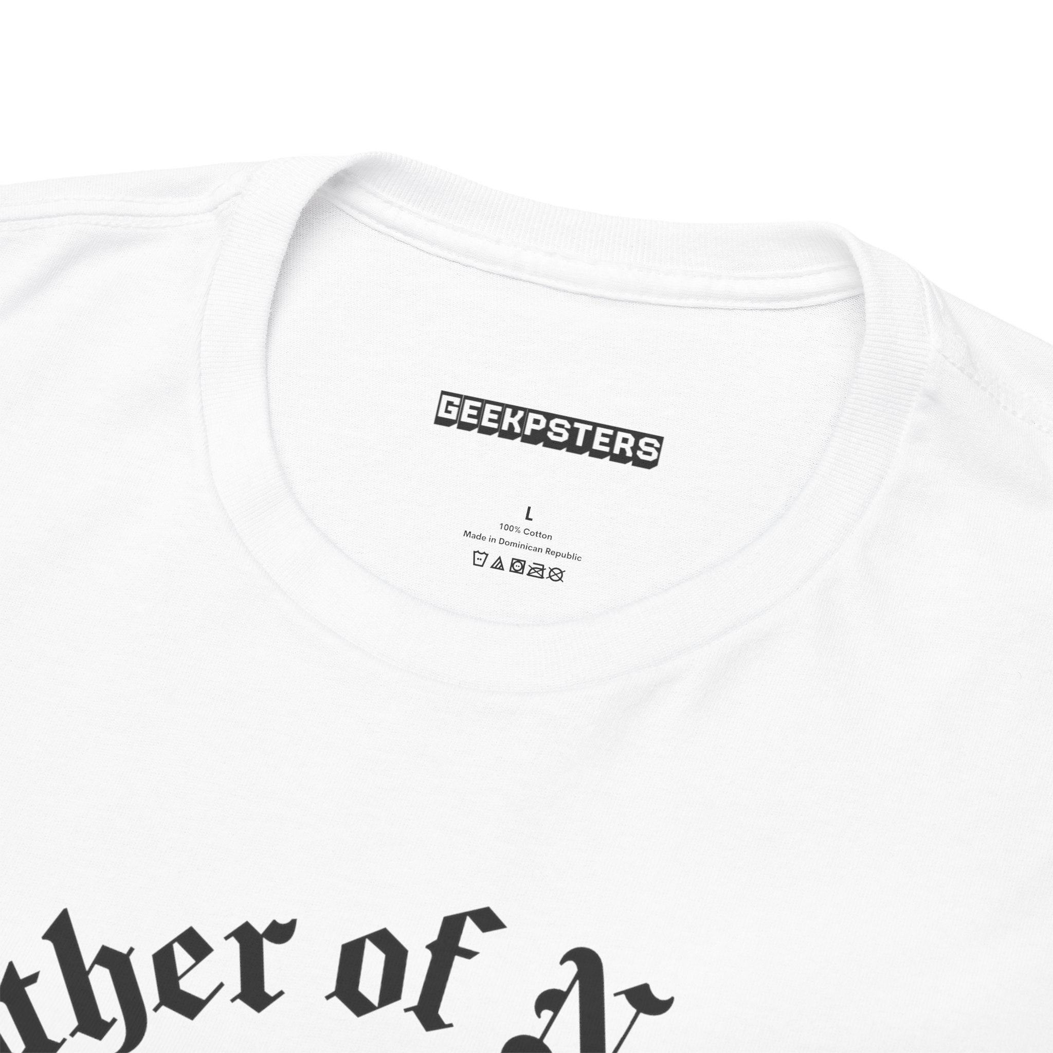 Close-up of a white "Father of Nation - Listenbourg T-Shirt," featuring "GEEKPSTERS" on the inside collar. The lower part subtly displays "ther of A," alluding to its Father of Nation theme with black lettering, celebrating nerdy pride.