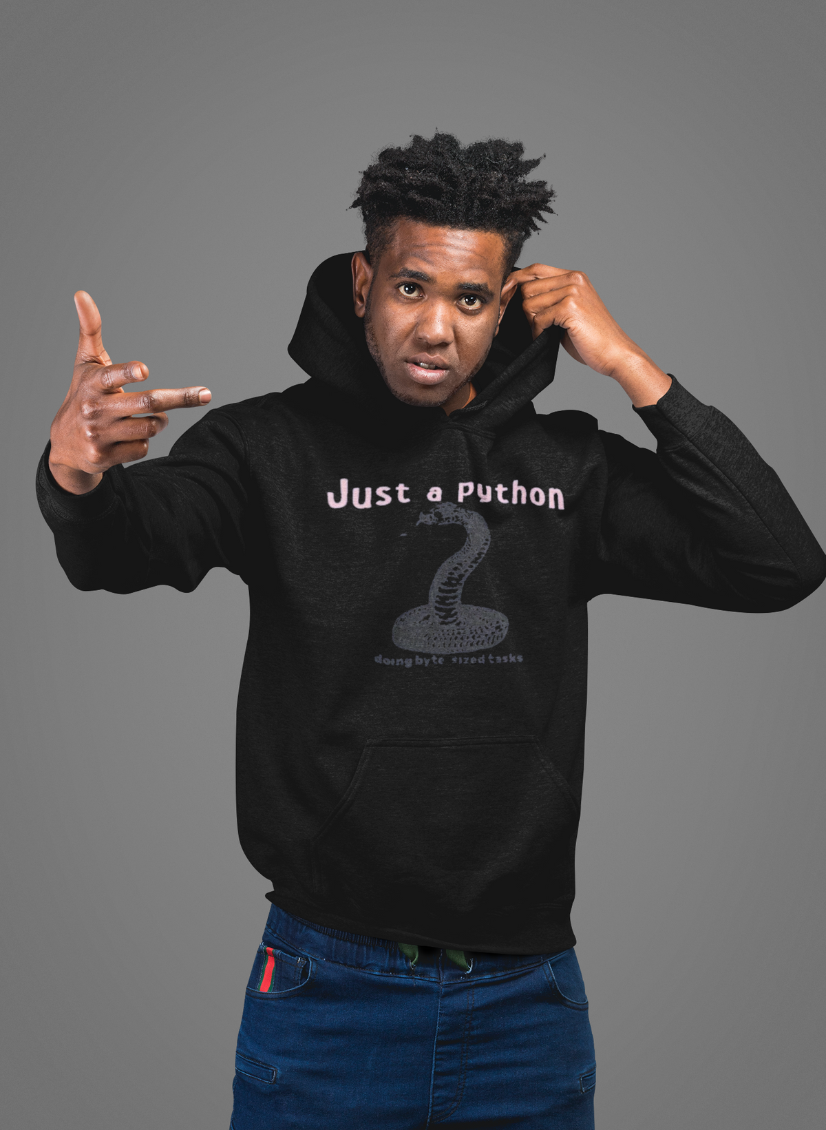 'Python' hoodie in black, man wearing it in a studio, Hoodie mockup, Geekpsters
