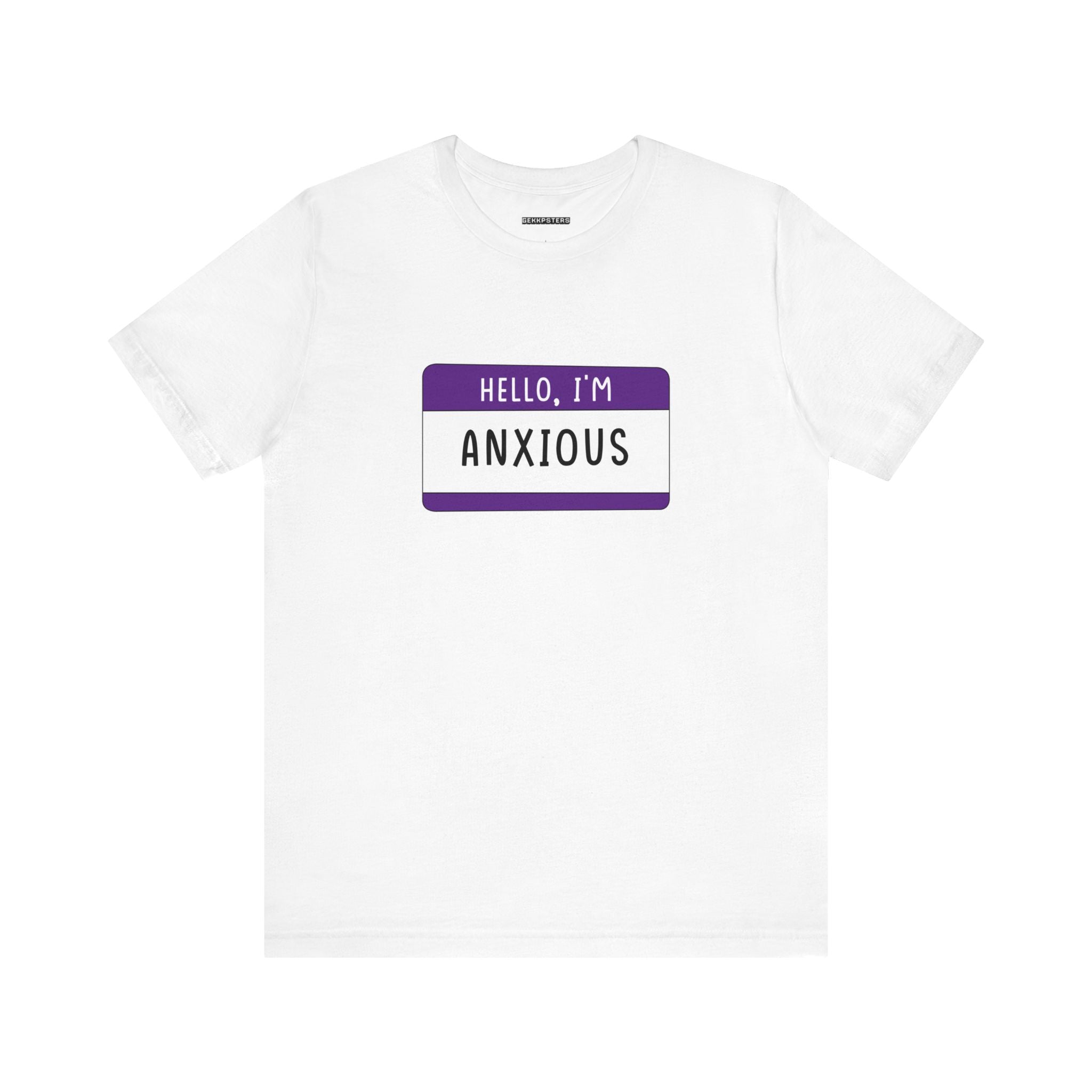 Check out the Hello, I'm Anxious T-shirt, showcasing a playful name tag design. This fashionable white tee features "Hello, I'm Anxious" printed in bold purple and black text, merging relatability with a lighthearted vibe.