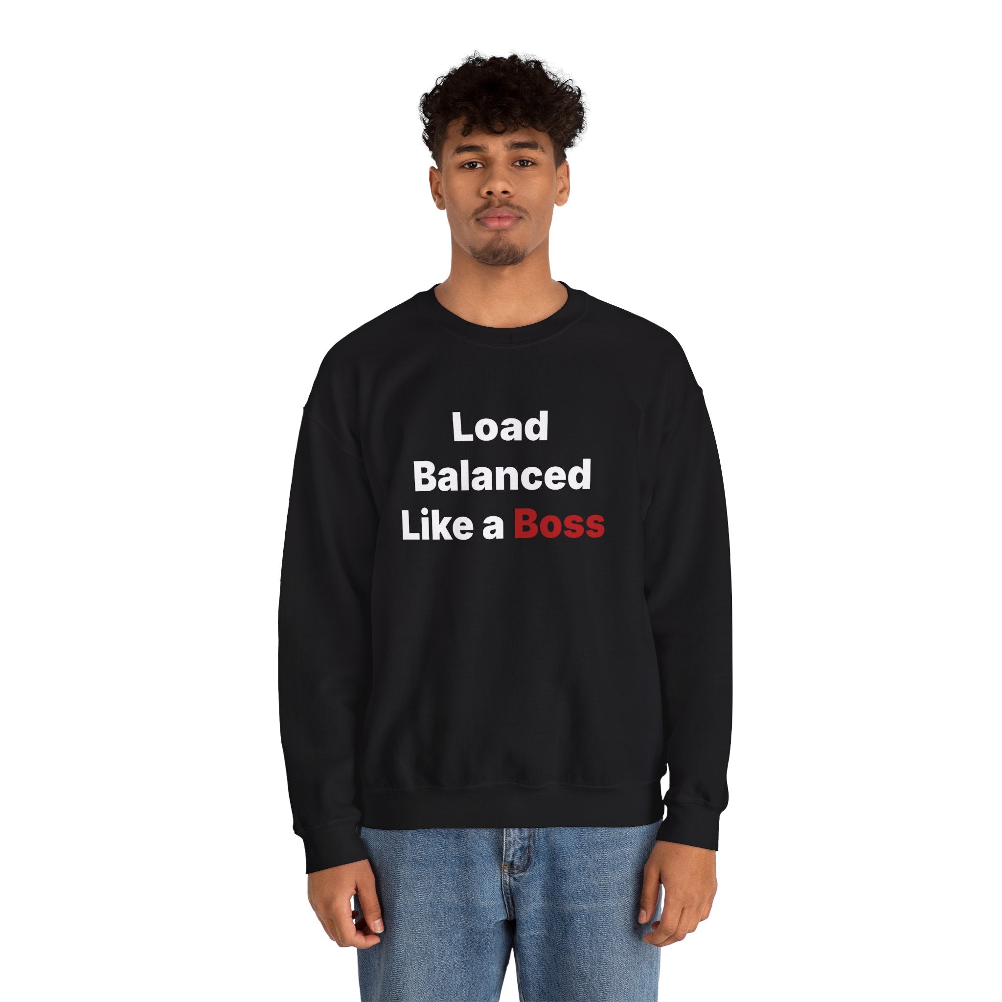A person wearing a cozy black sweatshirt, featuring the phrase "Load Balanced Like a Boss" in white and red, makes it perfect for that chilly weather.