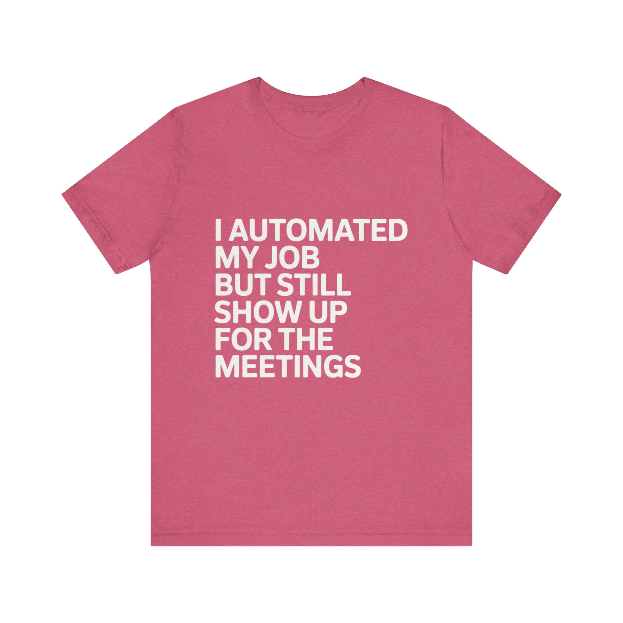 The "I Automated My Job But Still Show Up for the Meetings" t-shirt is a pink, funny programmer tee with bold white text on the frontāideal tech humor apparel for coders and developers who love clever statements.