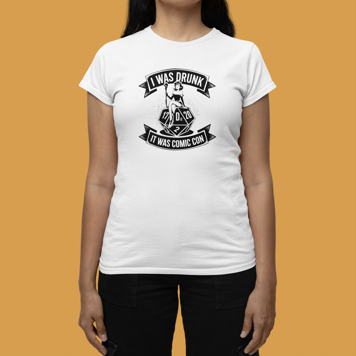 'I Was Drunk It Was Comic Con' womens tee in white, woman wearing it on mustard background, con gift